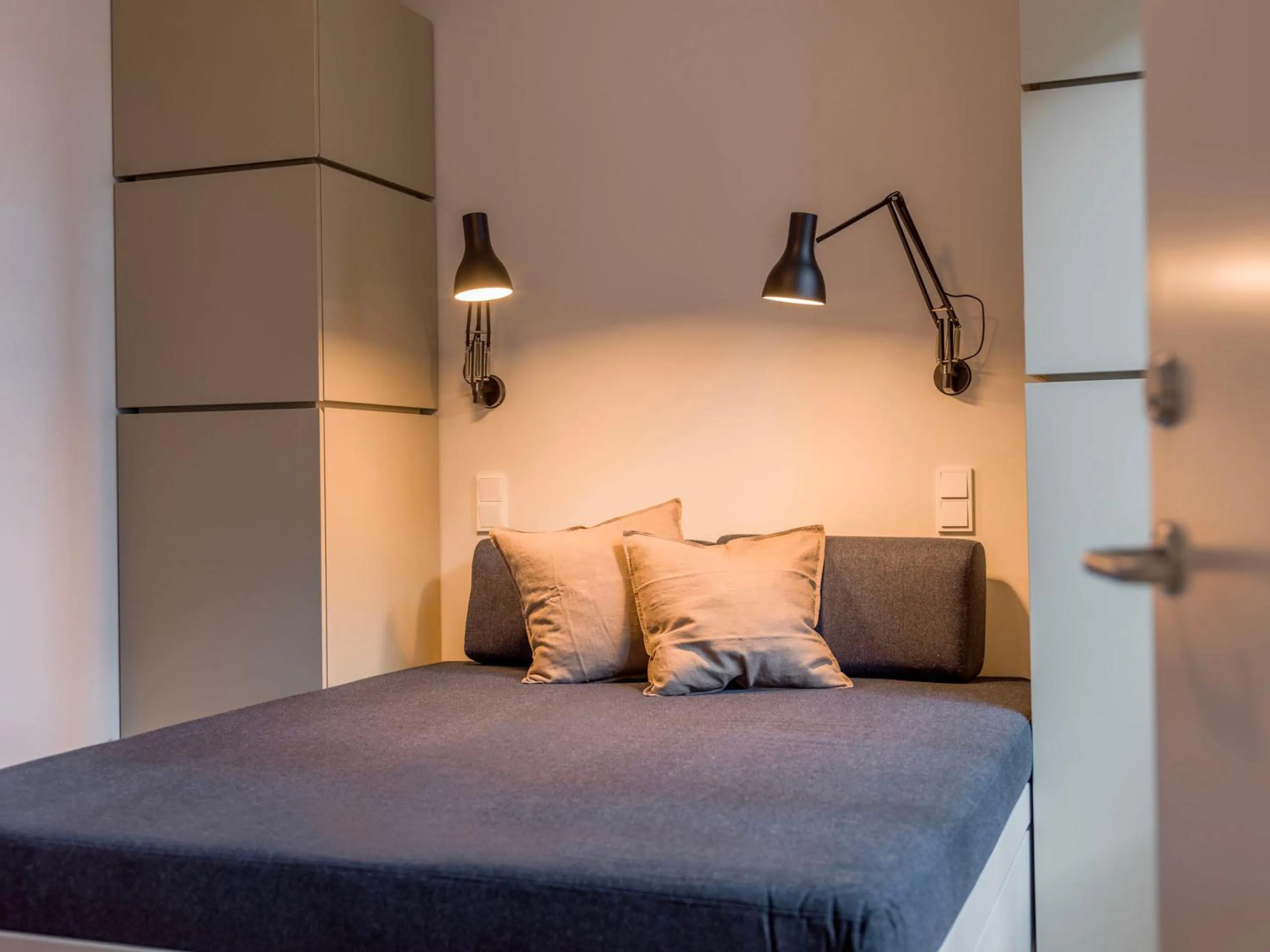 Bed in Unity Malmö - A Studio Hotel