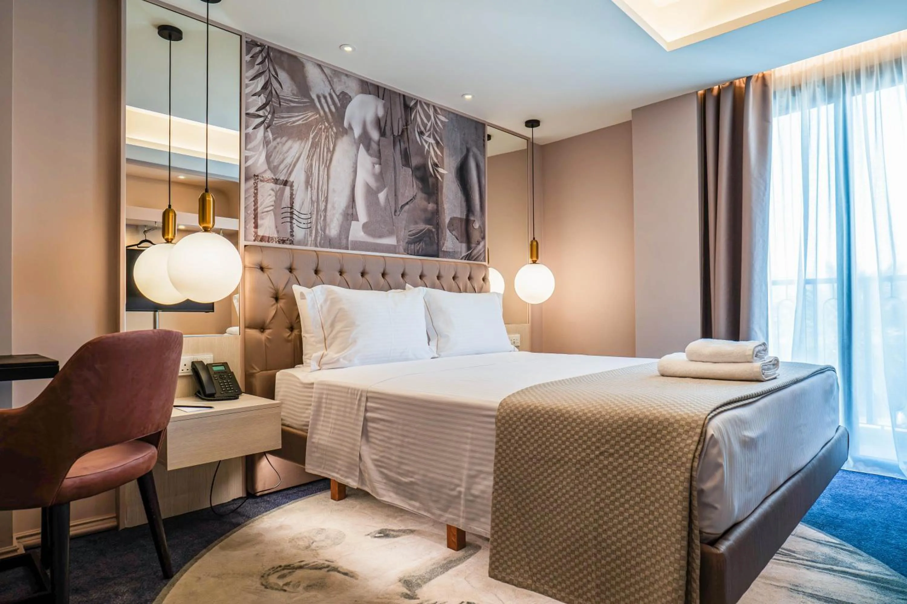 Bed in Gate Twenty Two Boutique Hotel