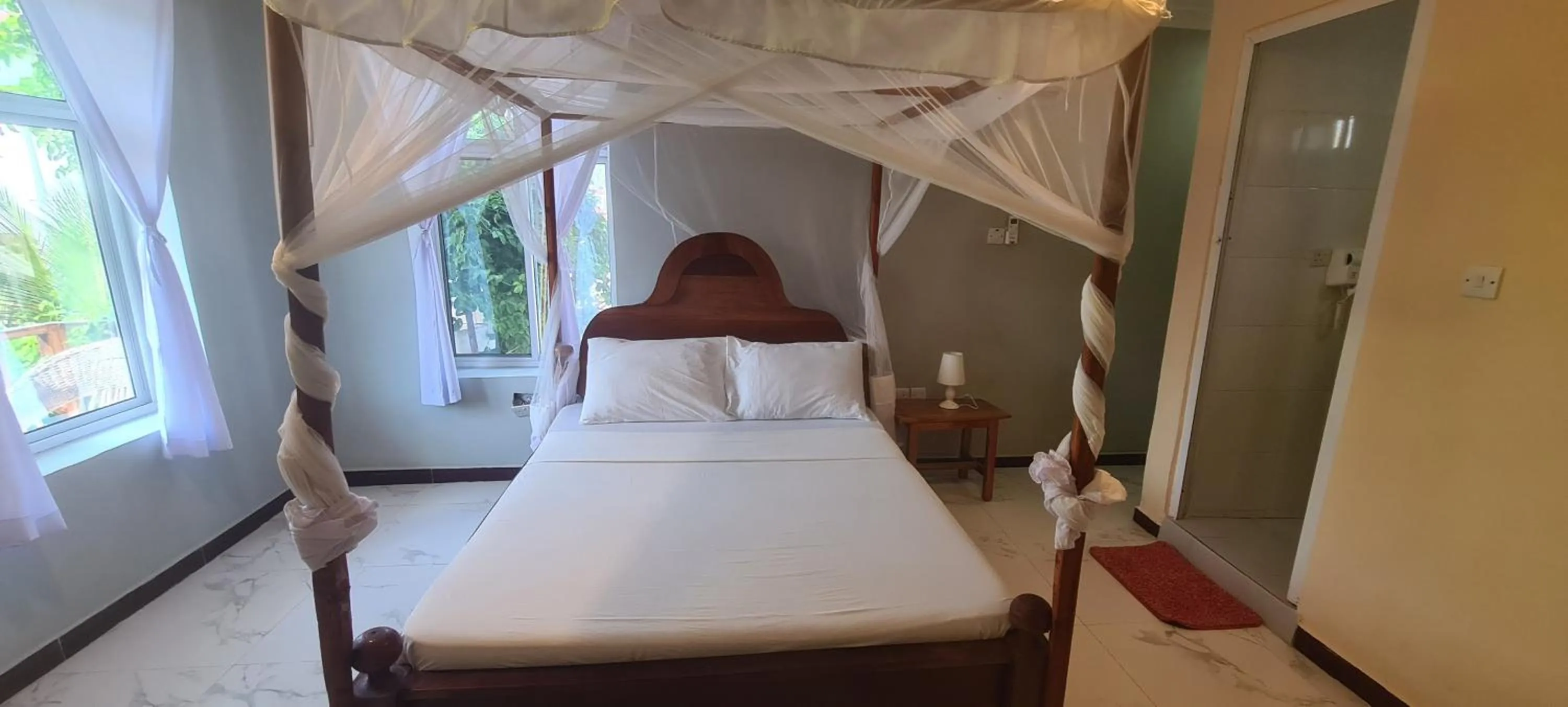 Bedroom in Mambo Boutique Nungwi