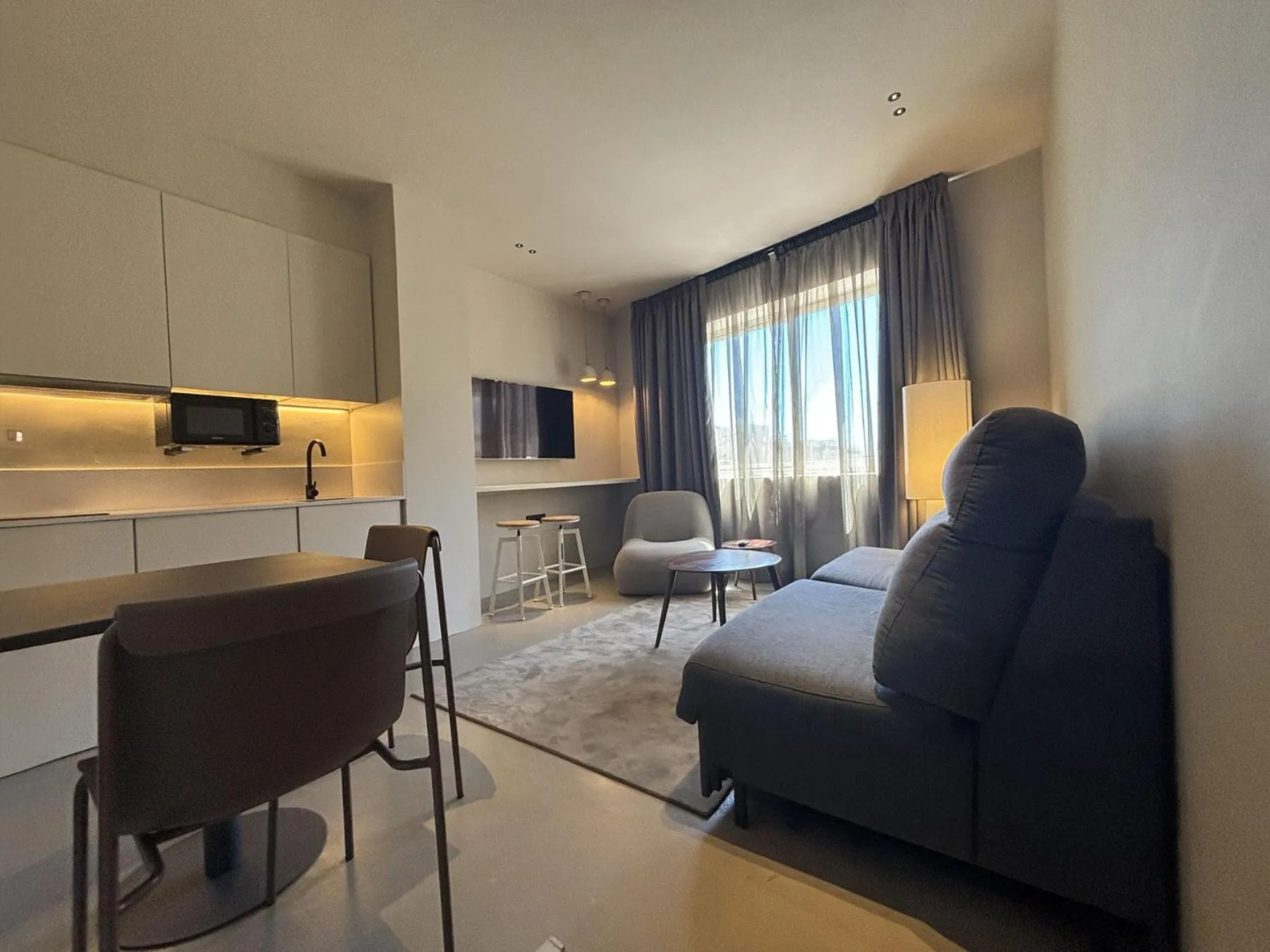 Living room, Bed in Senator Barcelona Apartments