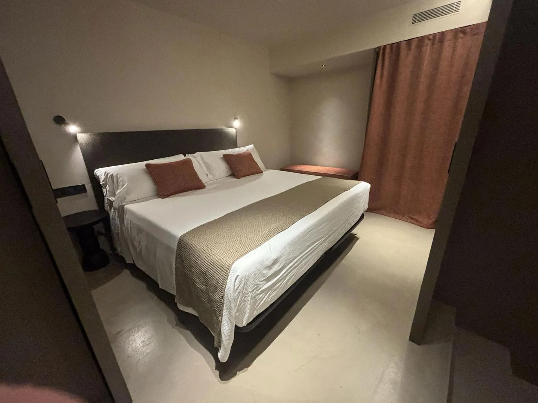 Bed in Senator Barcelona Apartments