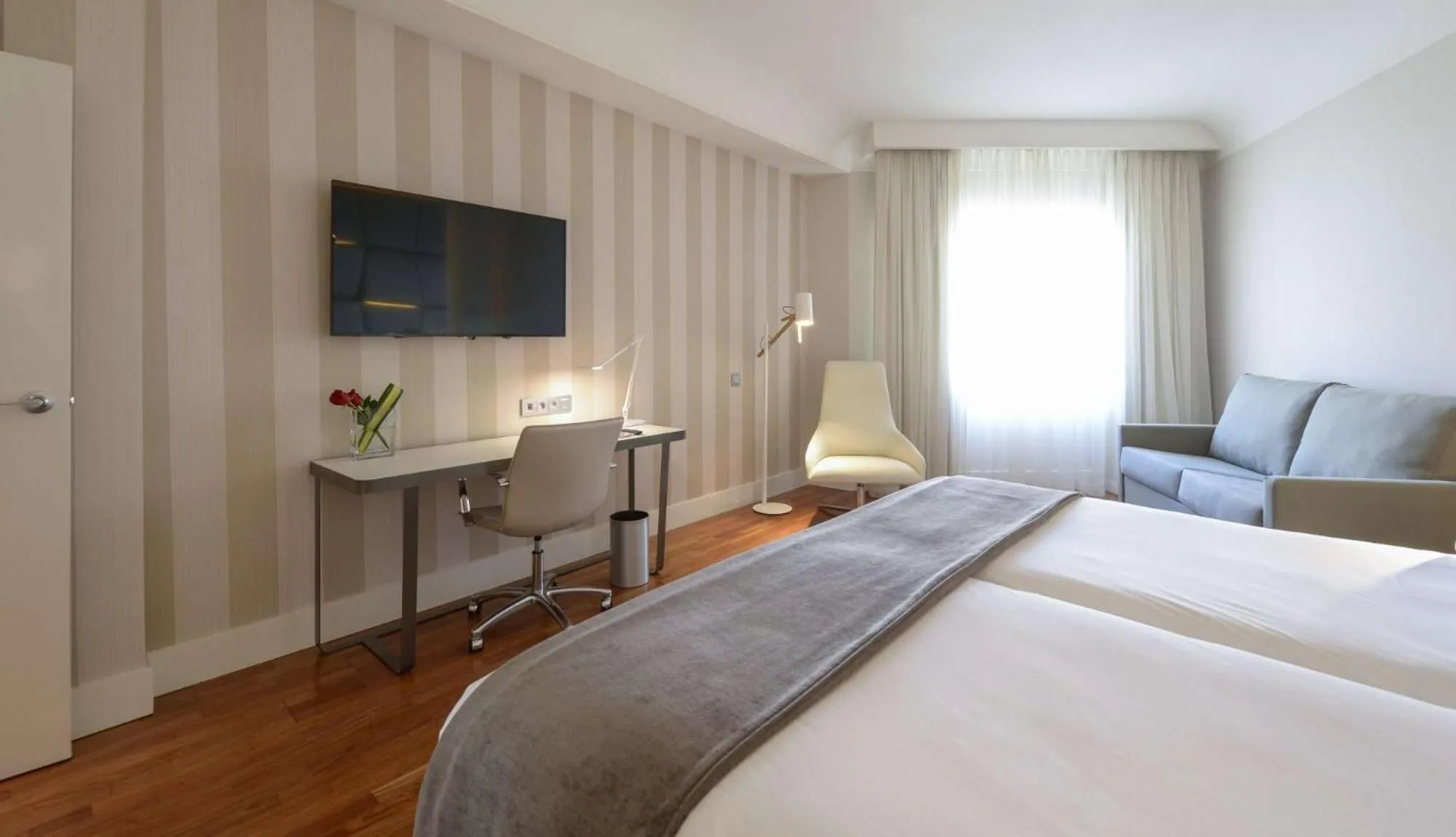 Premium Double Room with Extra Bed (2 Adults + 1 Child) in NH Collection Madrid Colón