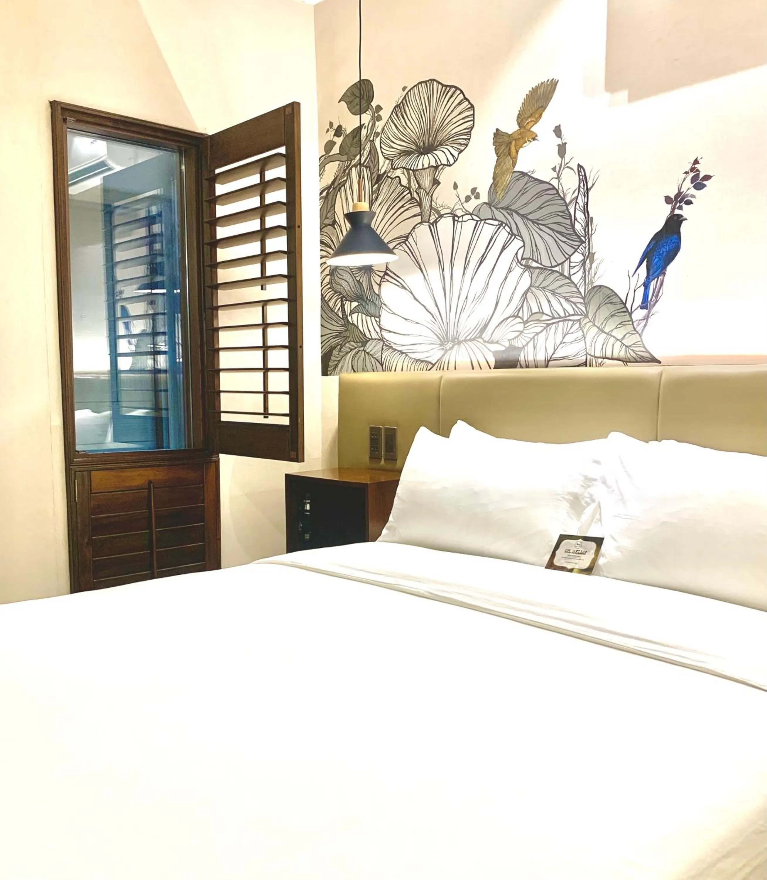 Photo of the whole room, Bed in The Henry Hotel Roost Bacolod