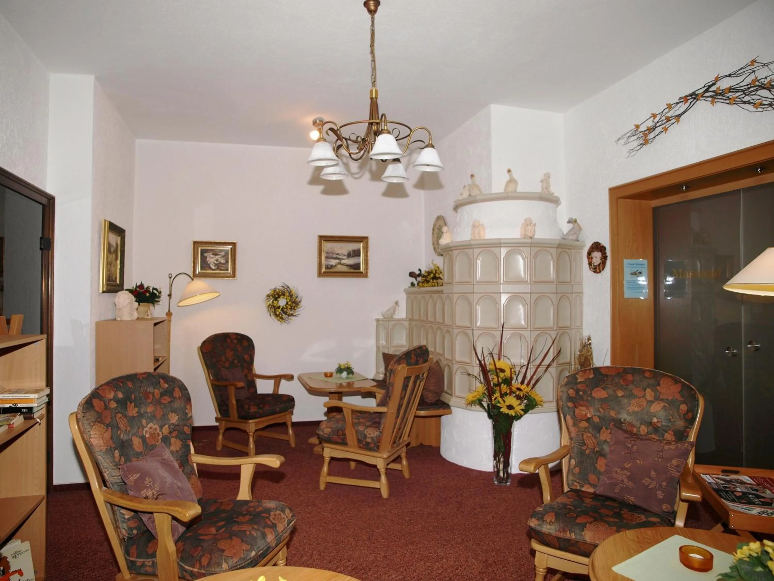 Communal lounge/ TV room in Ferienhotel Schwarzwälder Hof