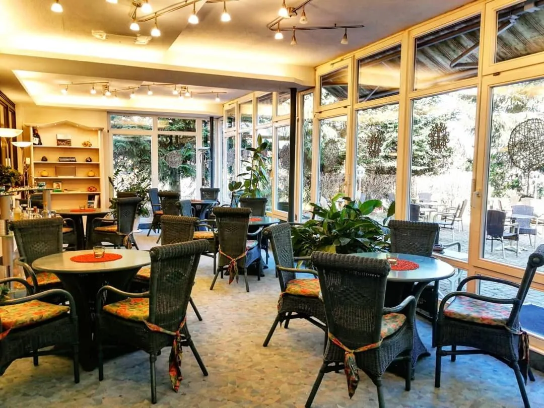 Communal lounge/ TV room in Ferienhotel Schwarzwälder Hof