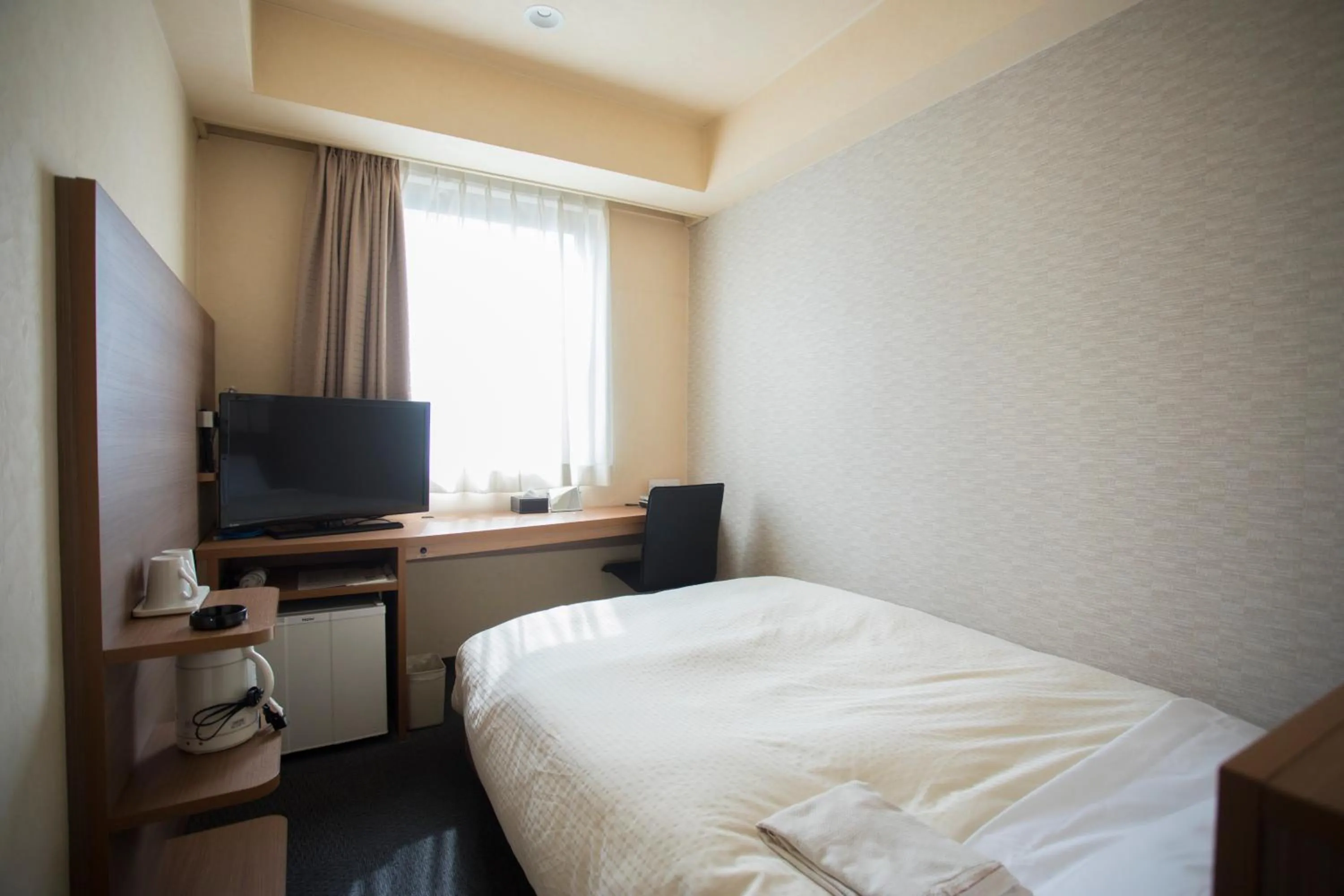 Photo of the whole room, TV/Entertainment Center in Hiroshima Pacific Hotel