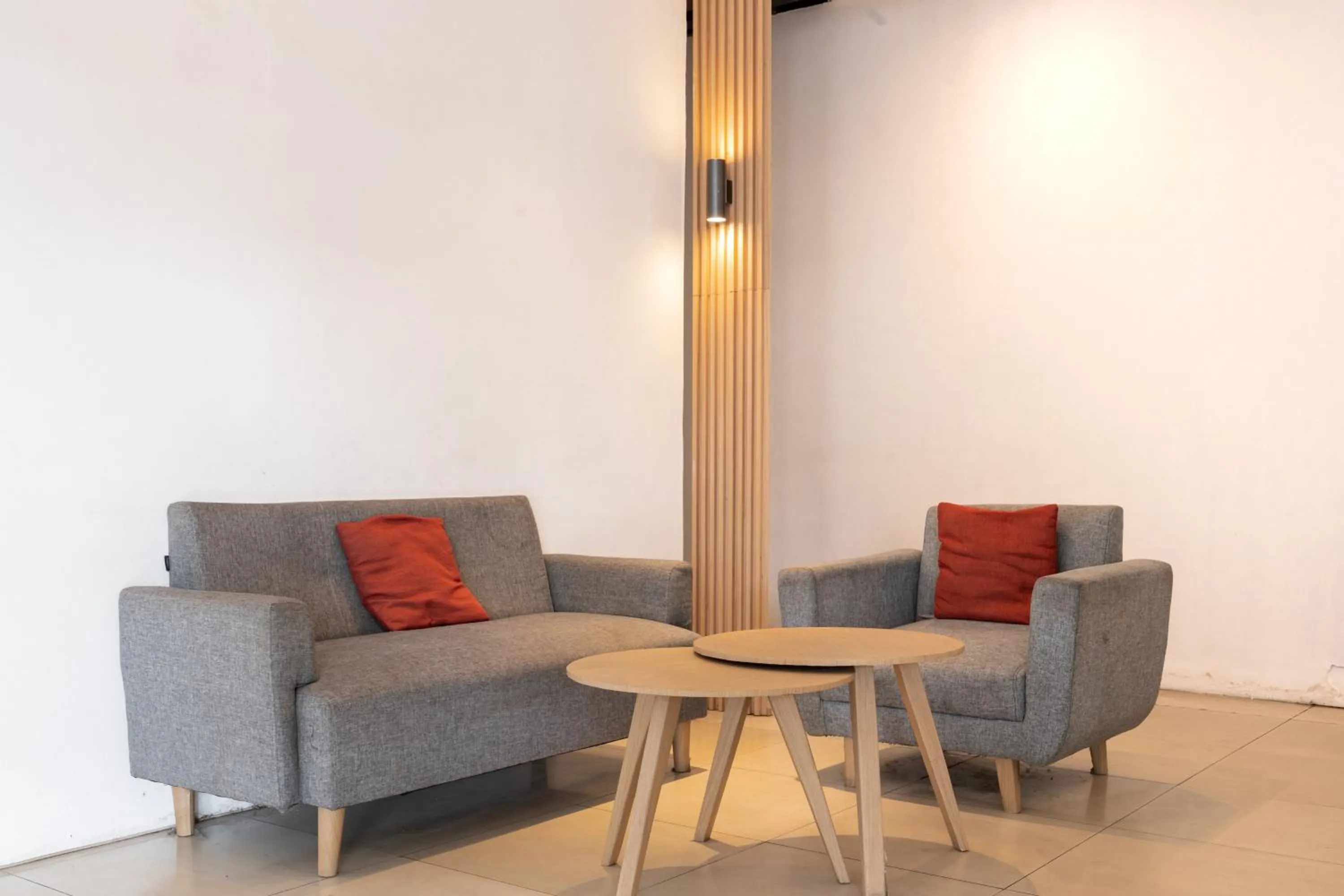 Seating area in Urbanview Hotel Cozy Samarinda by RedDoorz