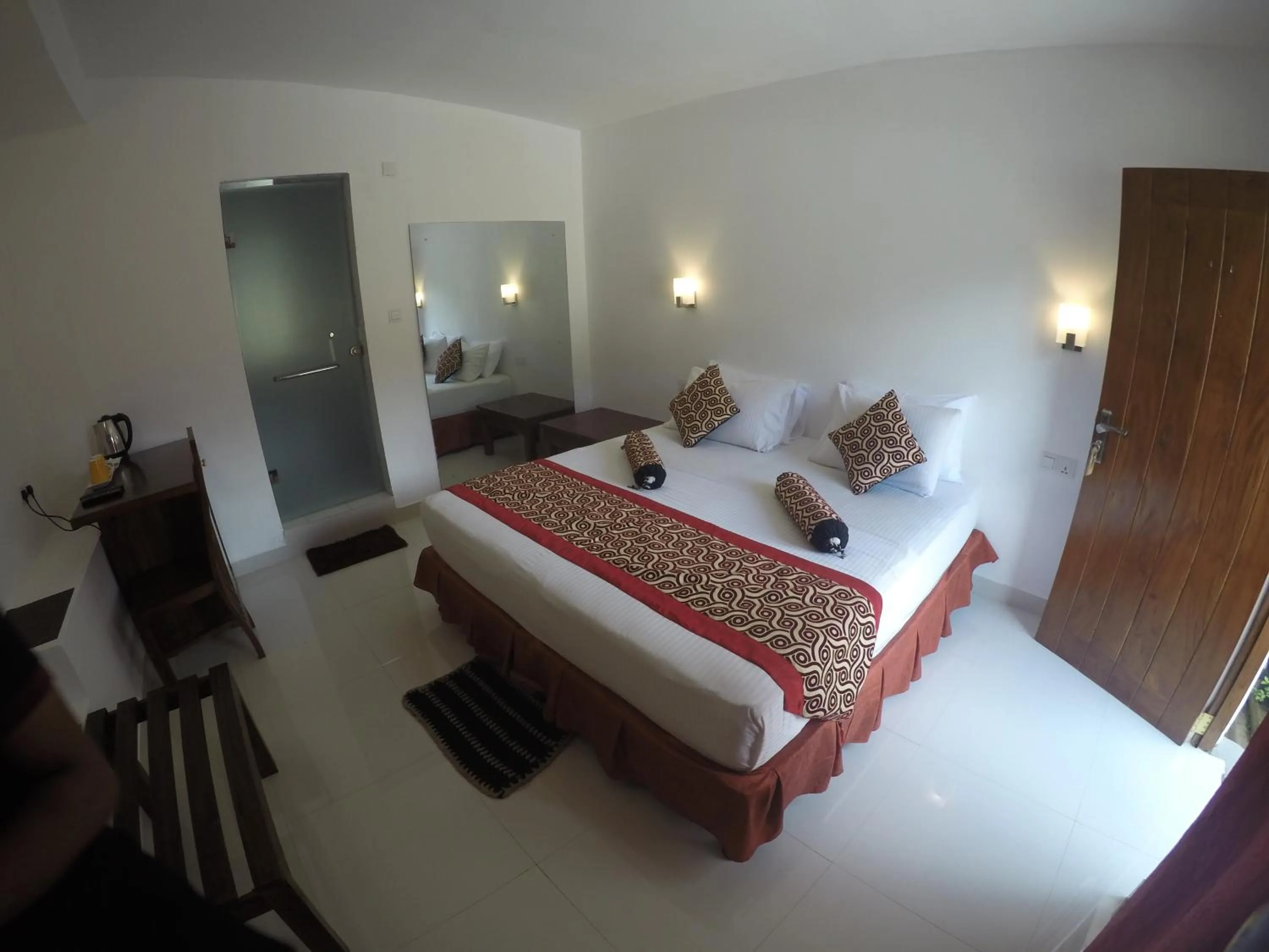 Photo of the whole room, Bed in Sizzle Sports Club