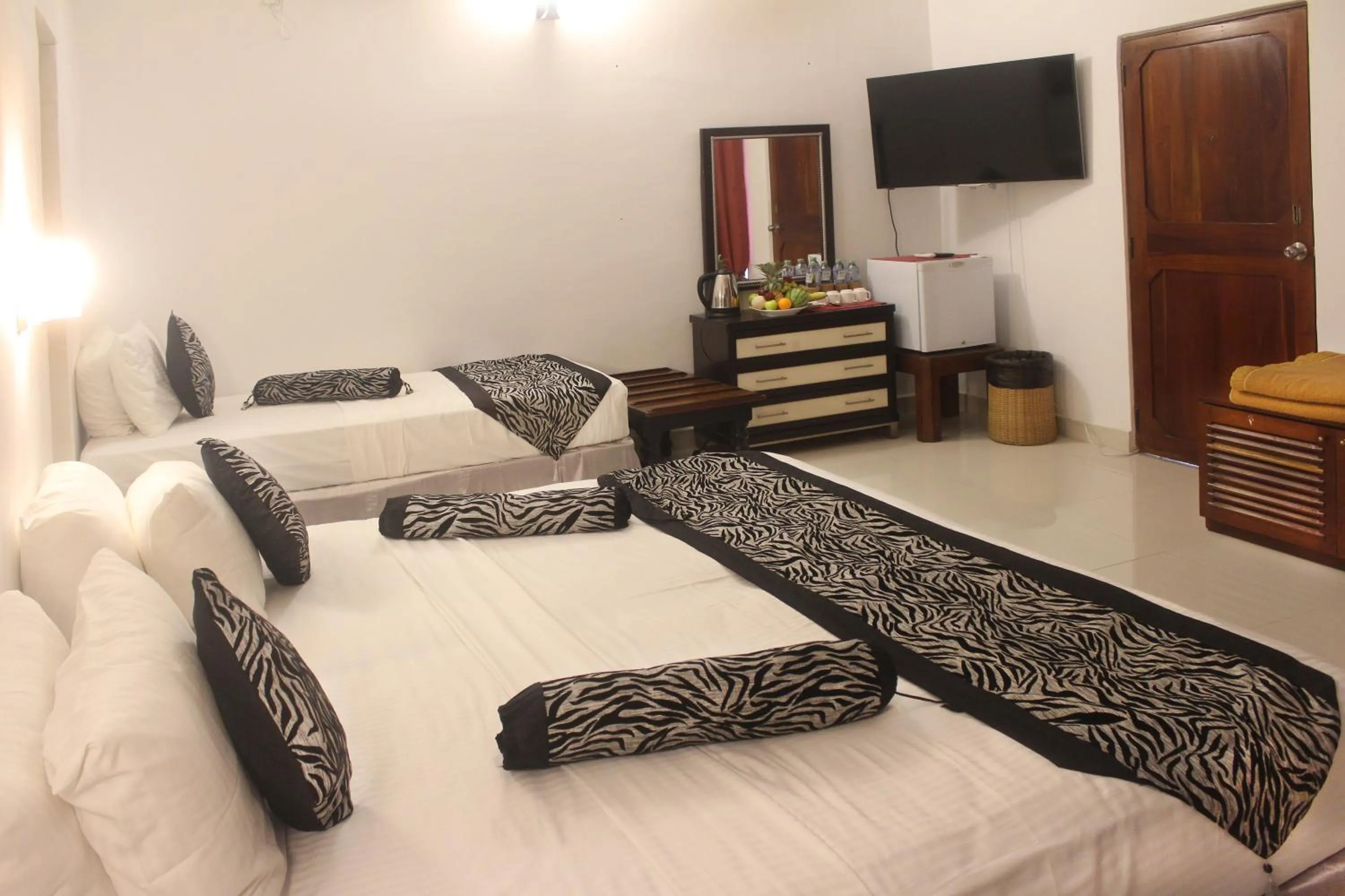 Photo of the whole room, Bed in Sizzle Sports Club