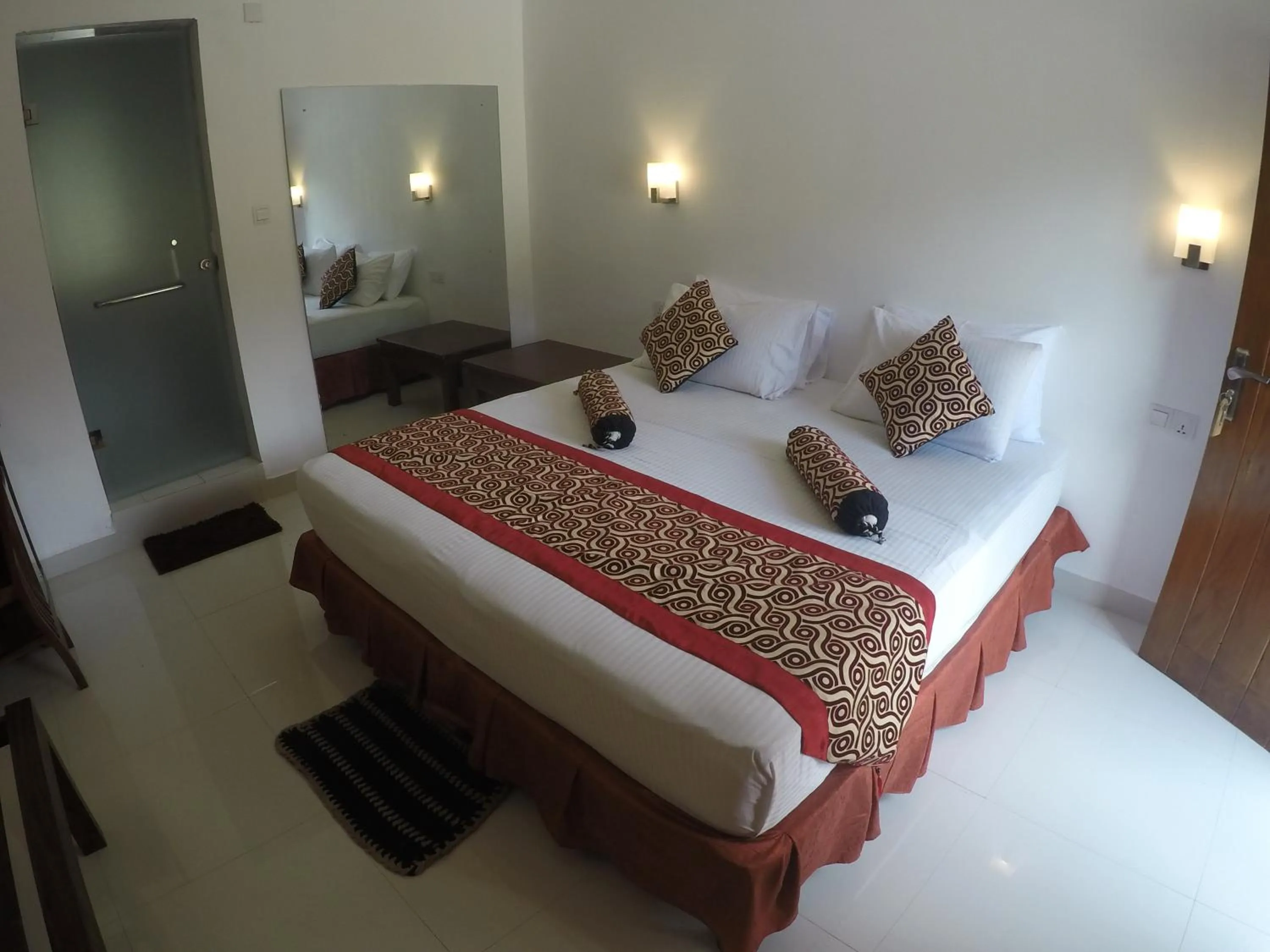 Photo of the whole room, Bed in Sizzle Sports Club