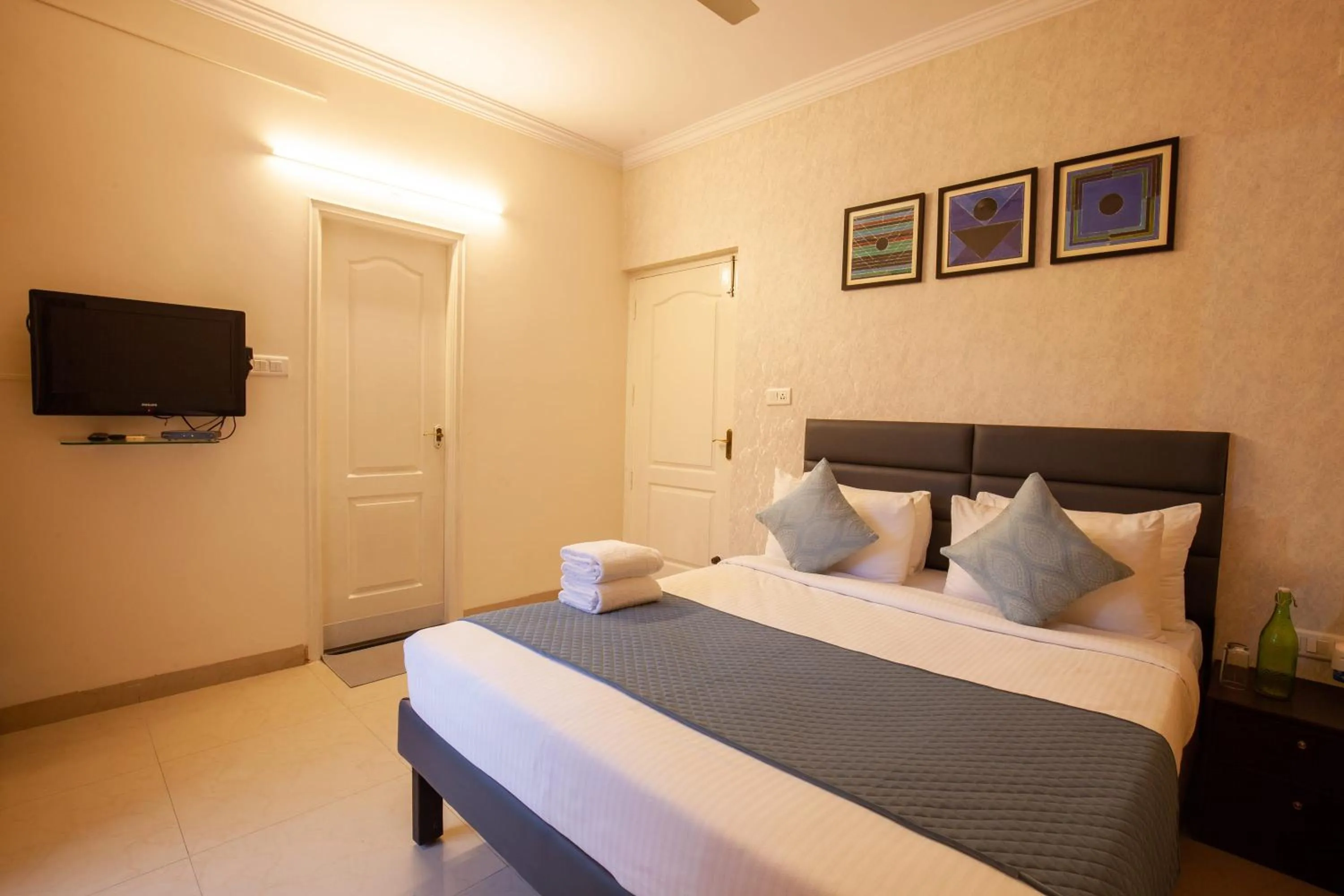 Bed in Iris Comforts Sharing service apartment