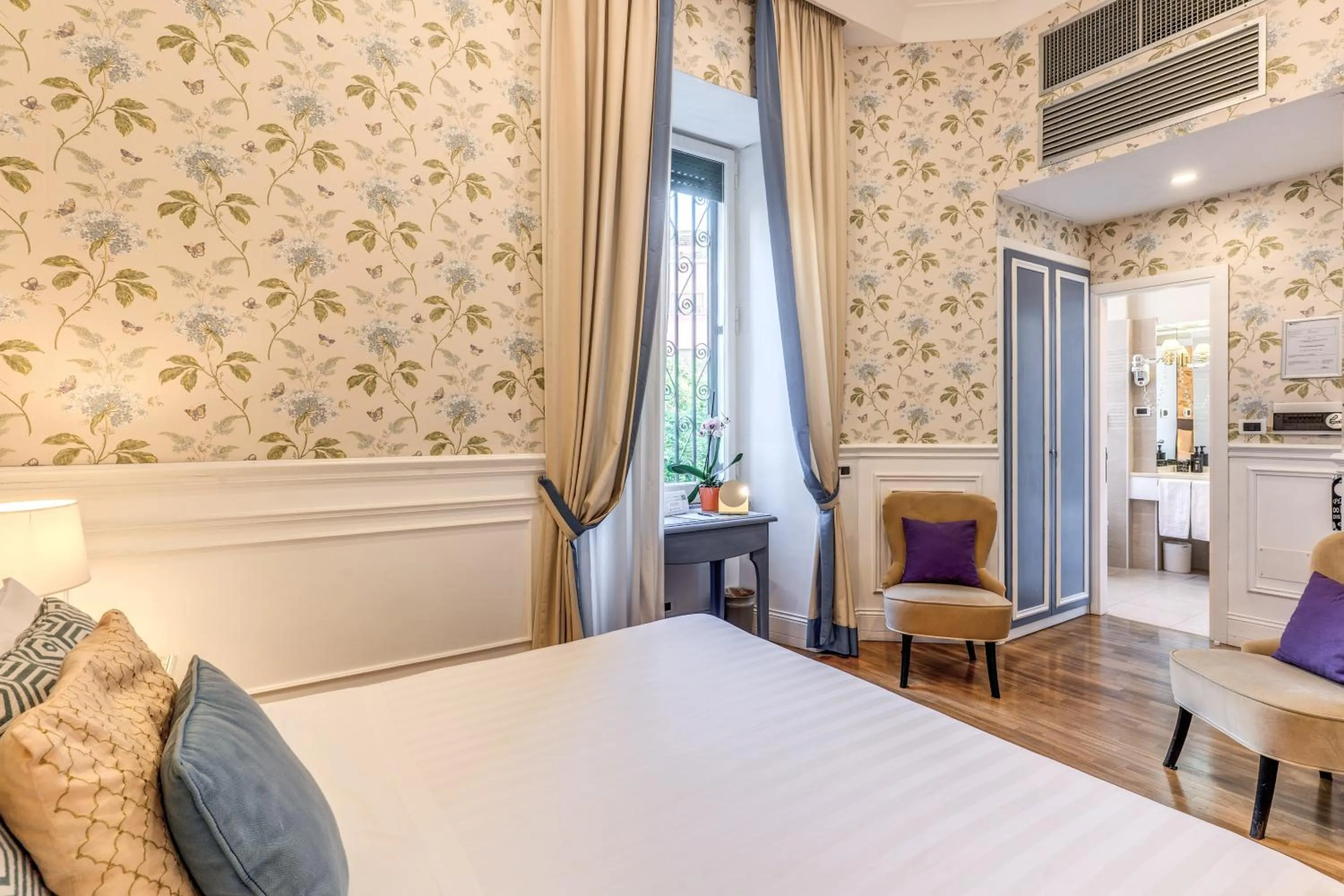 Bed in Mangili Garden Hotel