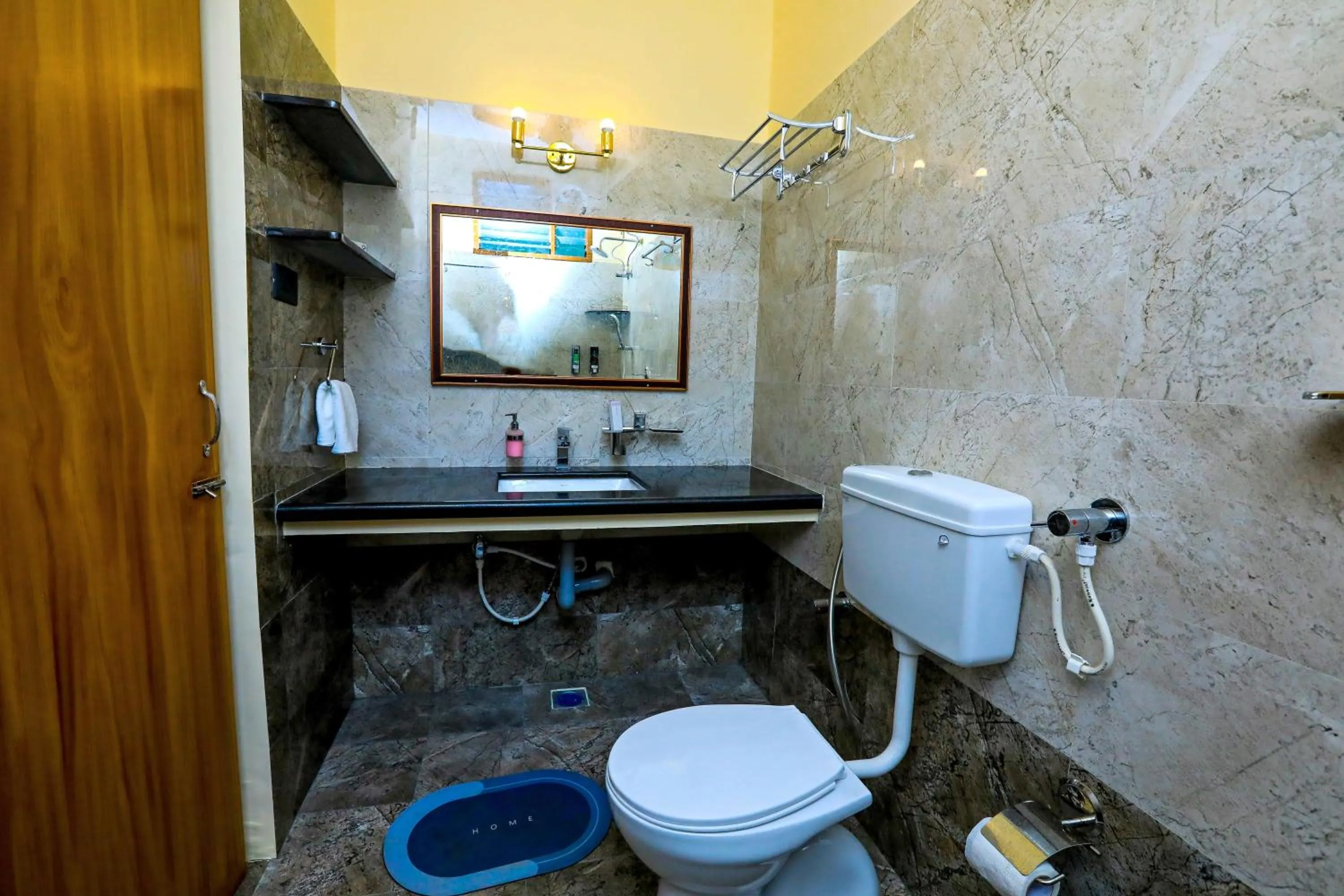 Toilet in Bay Homes 2BHK WT Bathtub Near Rock Beach