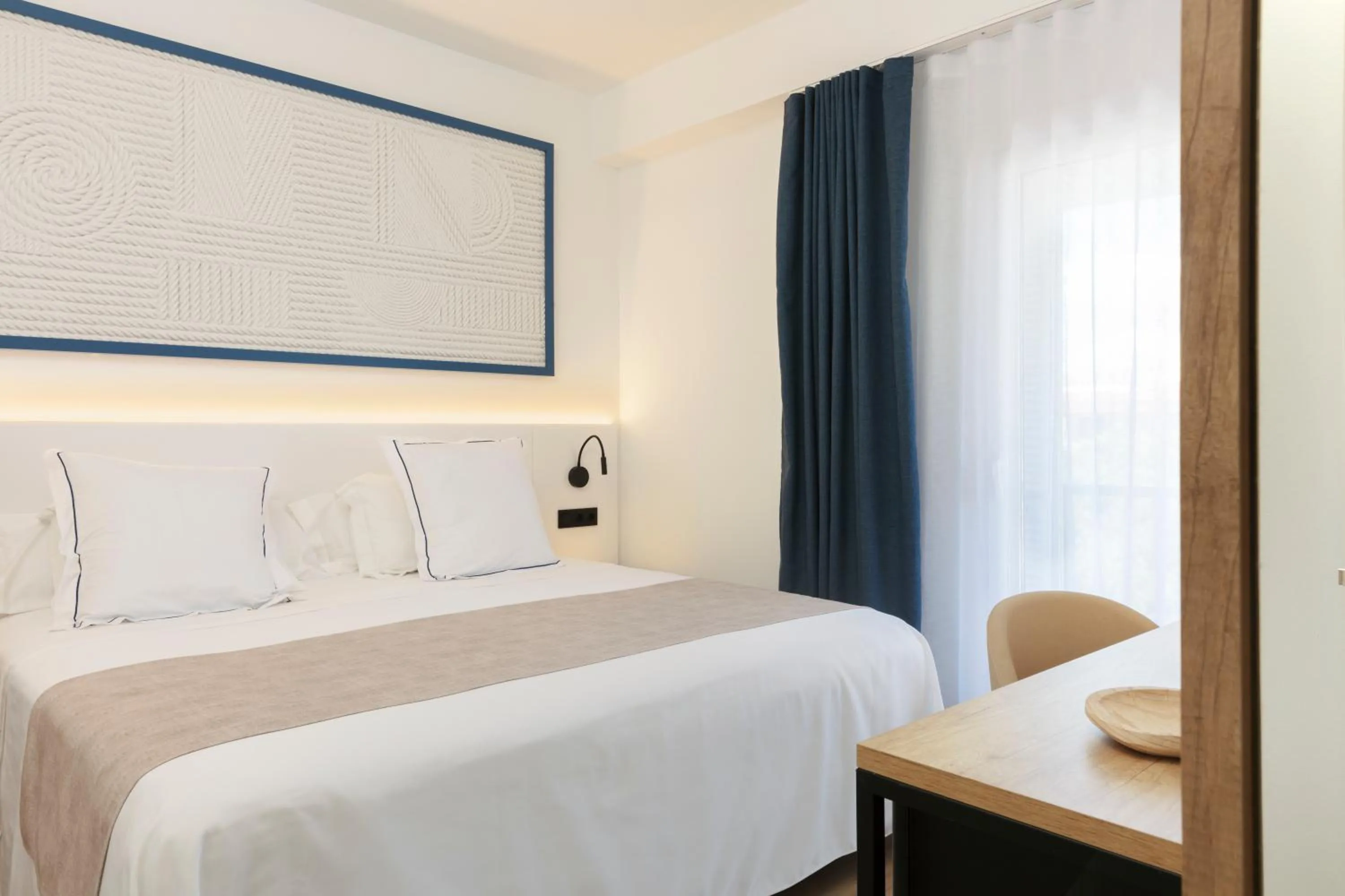 Bed in Hotel Rovira