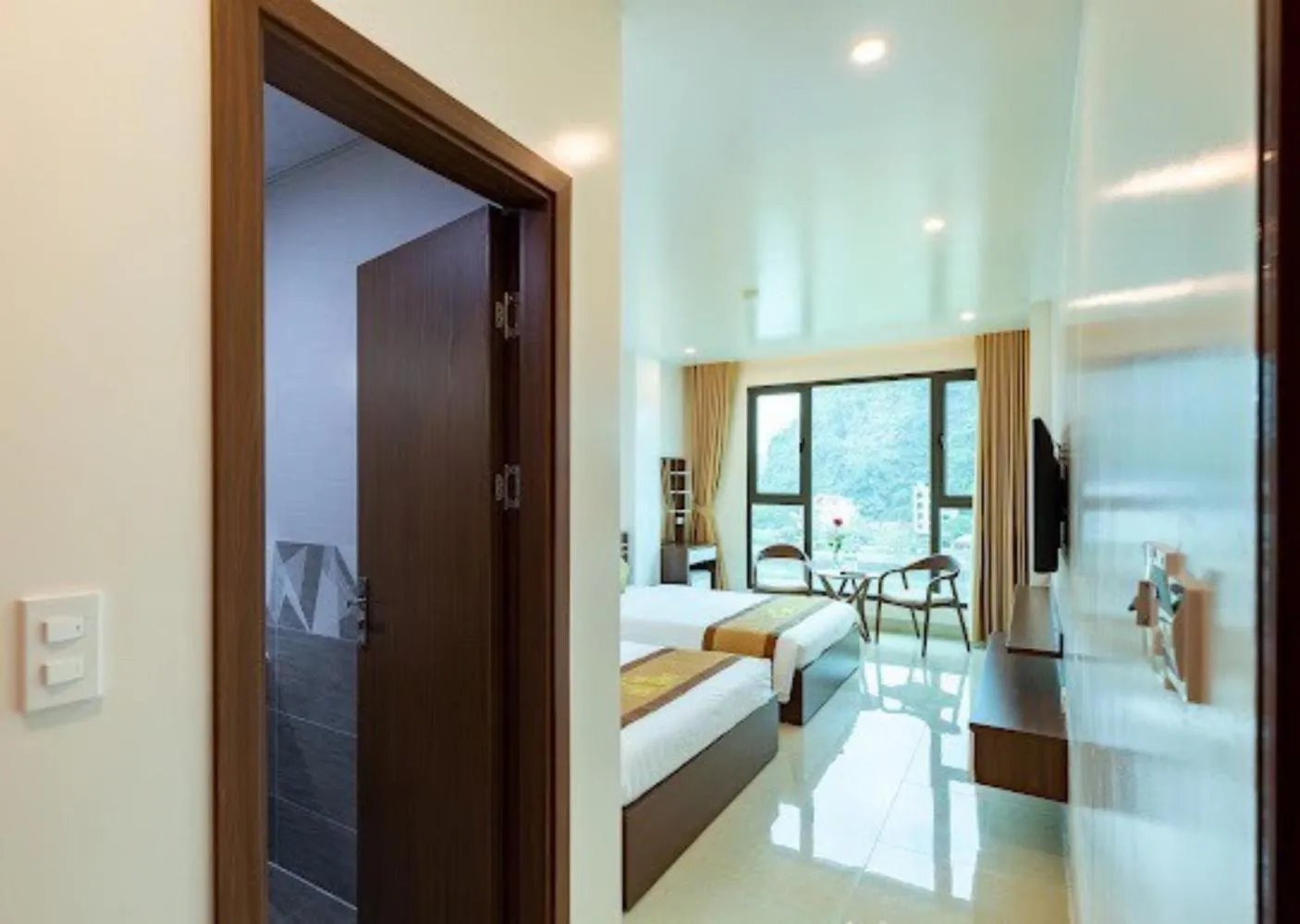 Photo of the whole room, Bed in Tung Quang Hotel