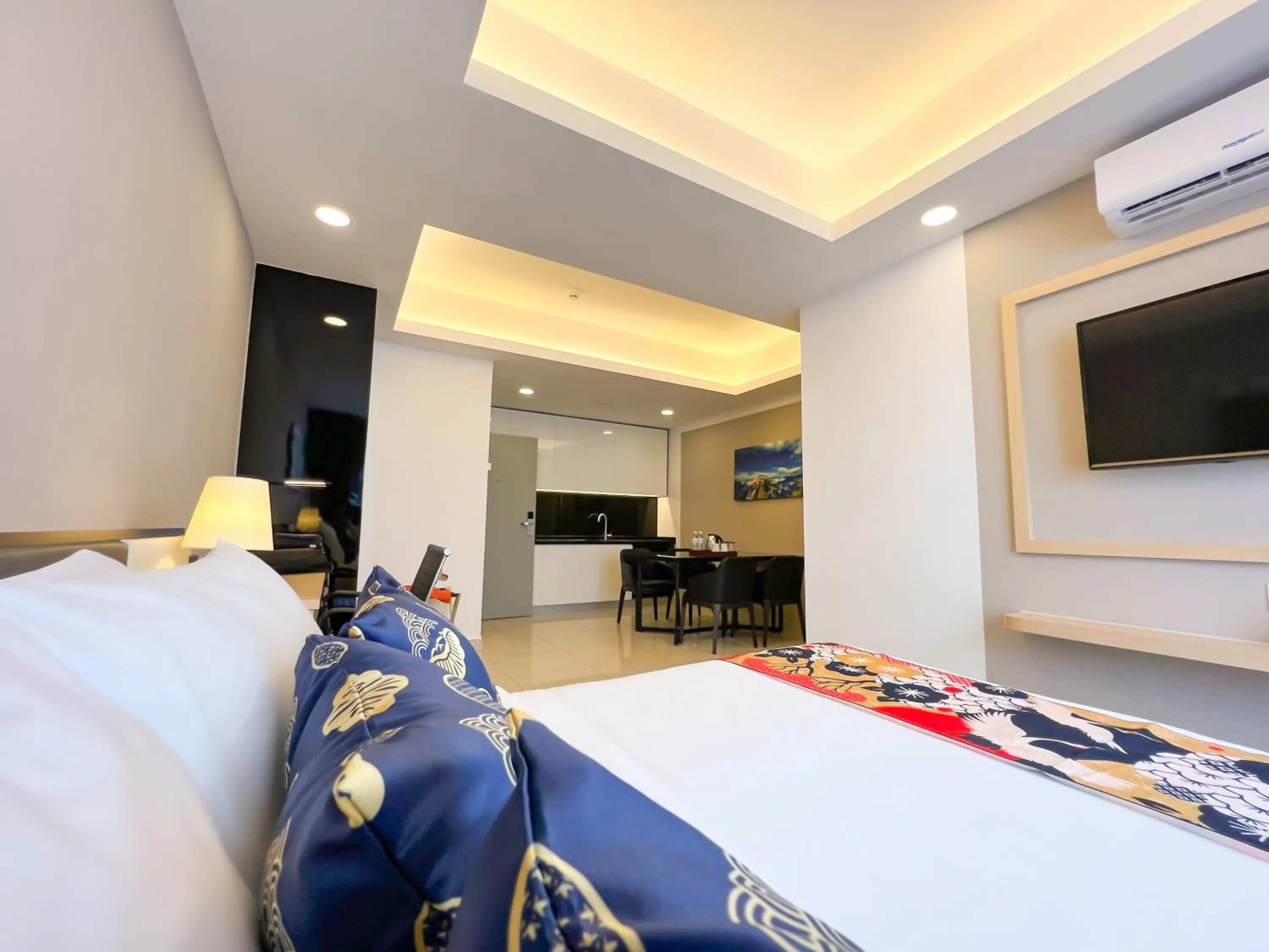 Bed in The Yanné, Onsen Hotel