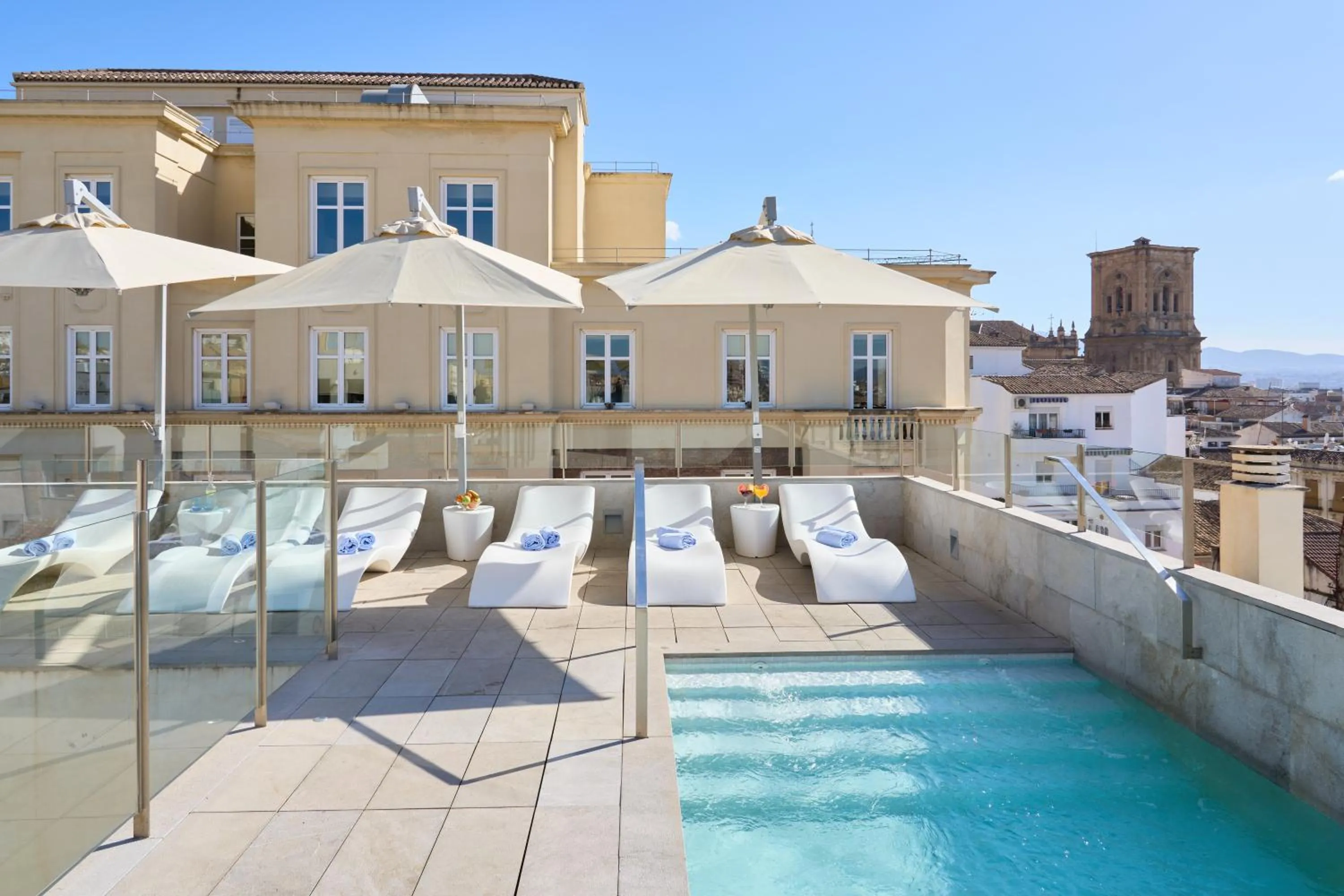 Swimming pool in Hotel Maciá Granada Five Senses Rooms & Suites