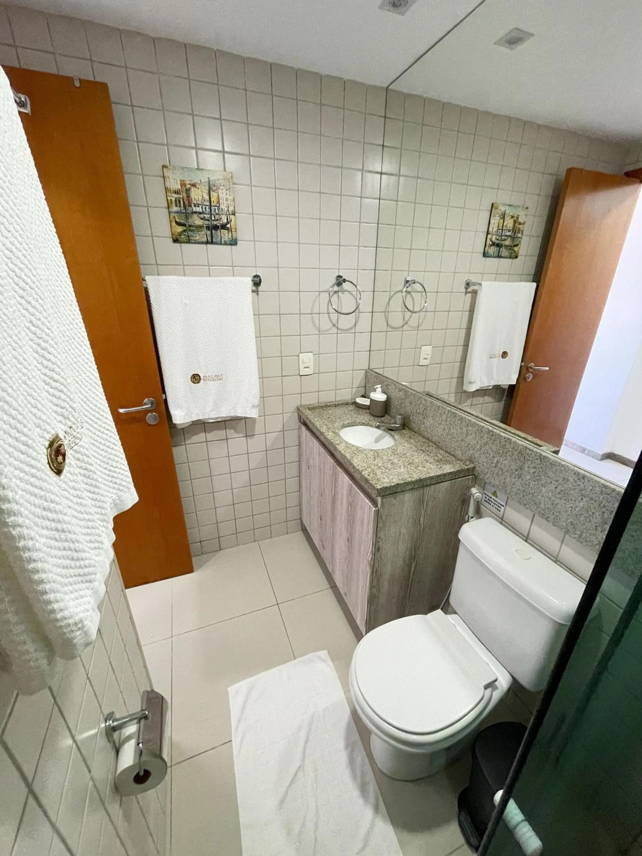 Toilet in Duplex de Luxo - Muro Alto Malawí