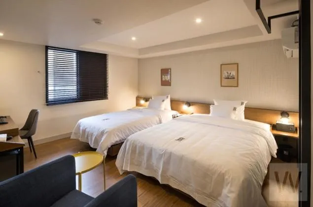 Bed in Number 25 Hotel Gimhae Eobang