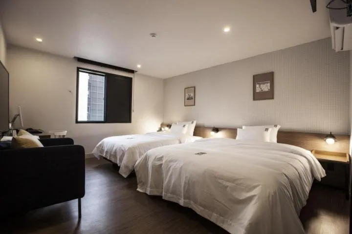 Bed in Number 25 Hotel Gimhae Eobang