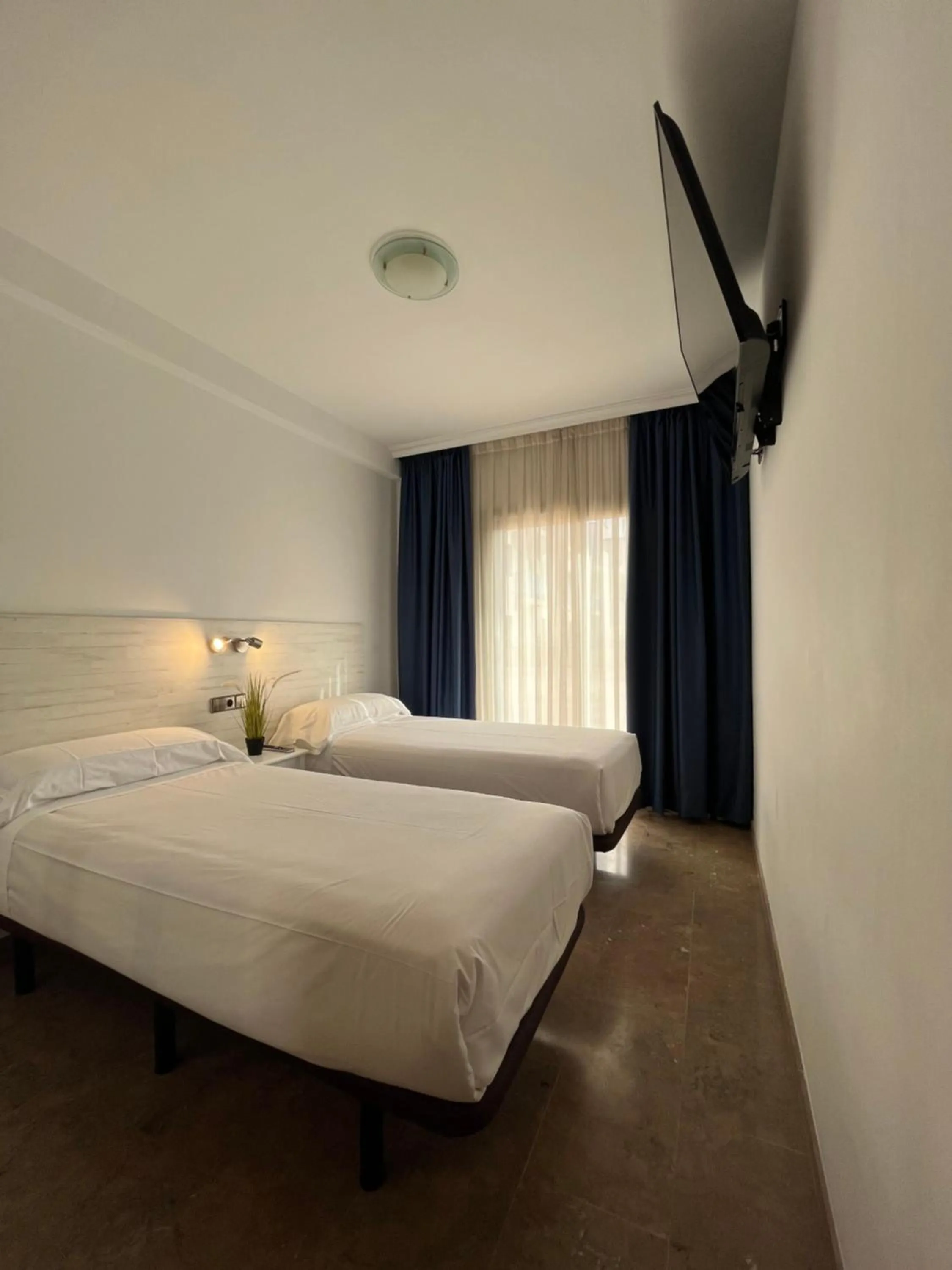 Bed in Hotel Port Sitges