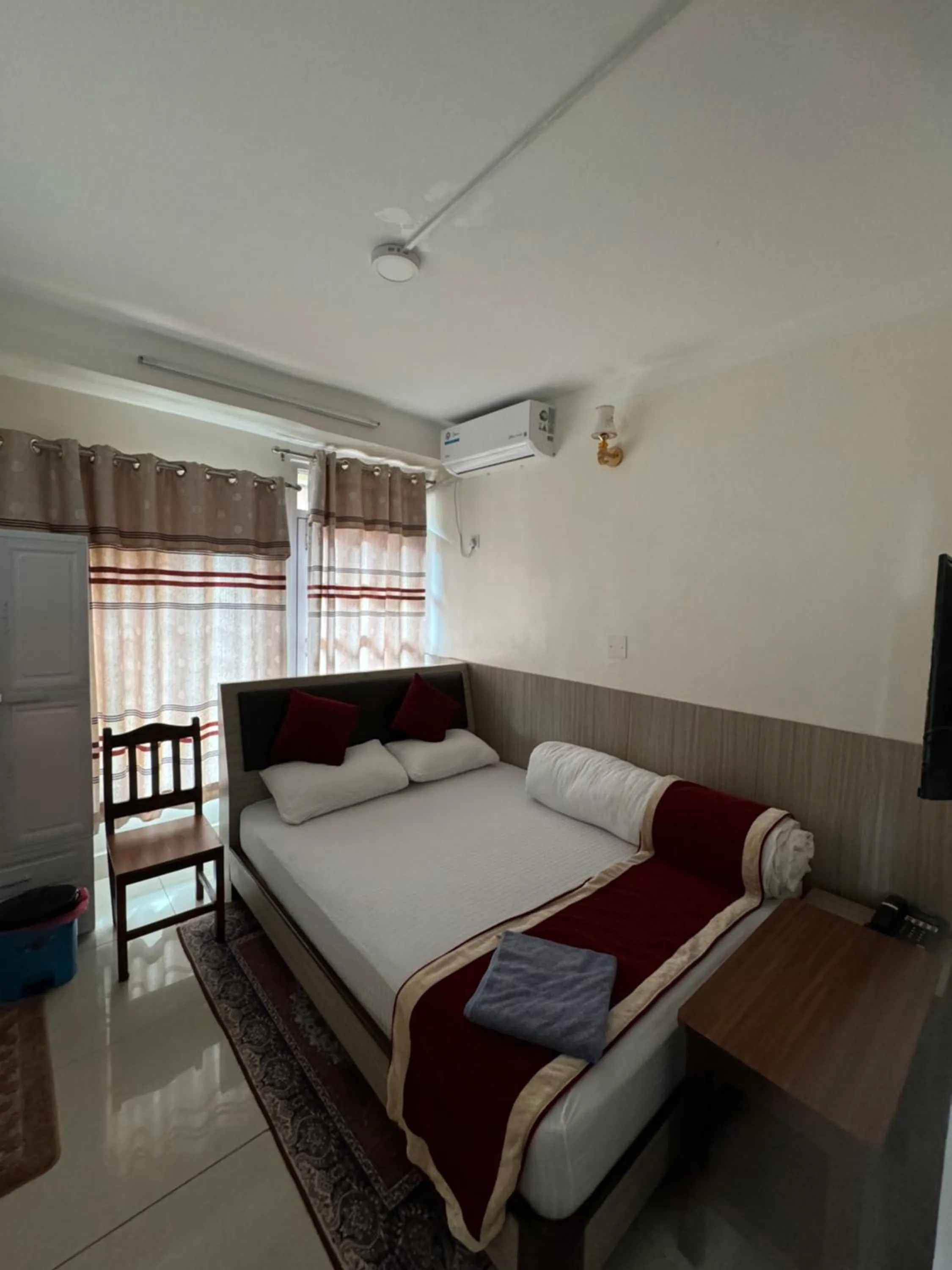 Bed in Om Bramha Hotel