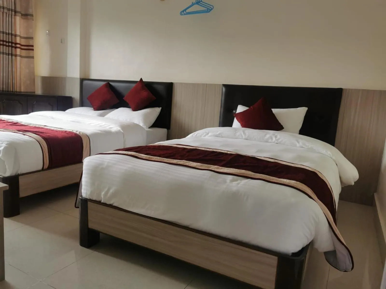 Photo of the whole room, Bed in Om Bramha Hotel