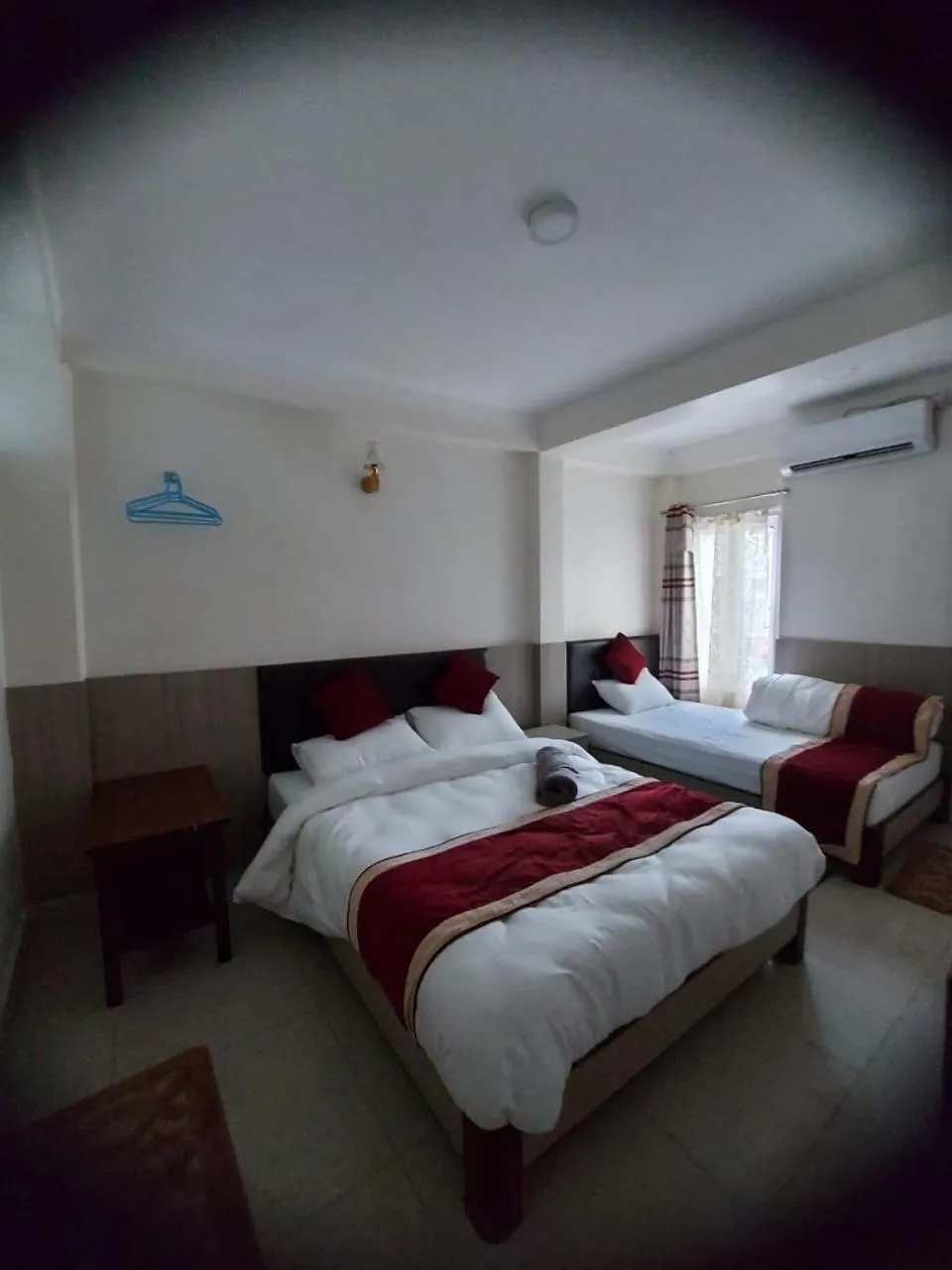 Photo of the whole room, Bed in Om Bramha Hotel