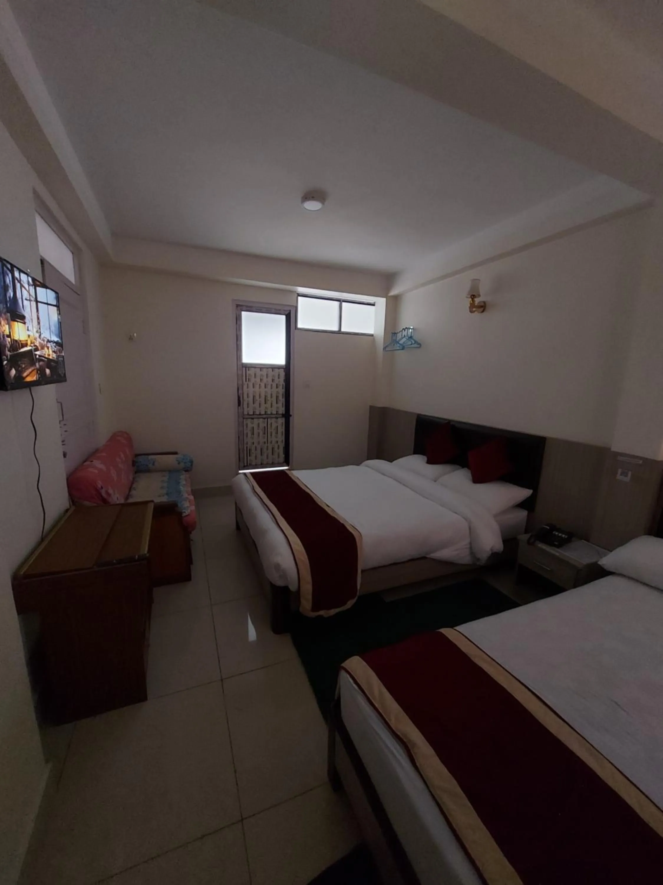 Bed in Om Bramha Hotel