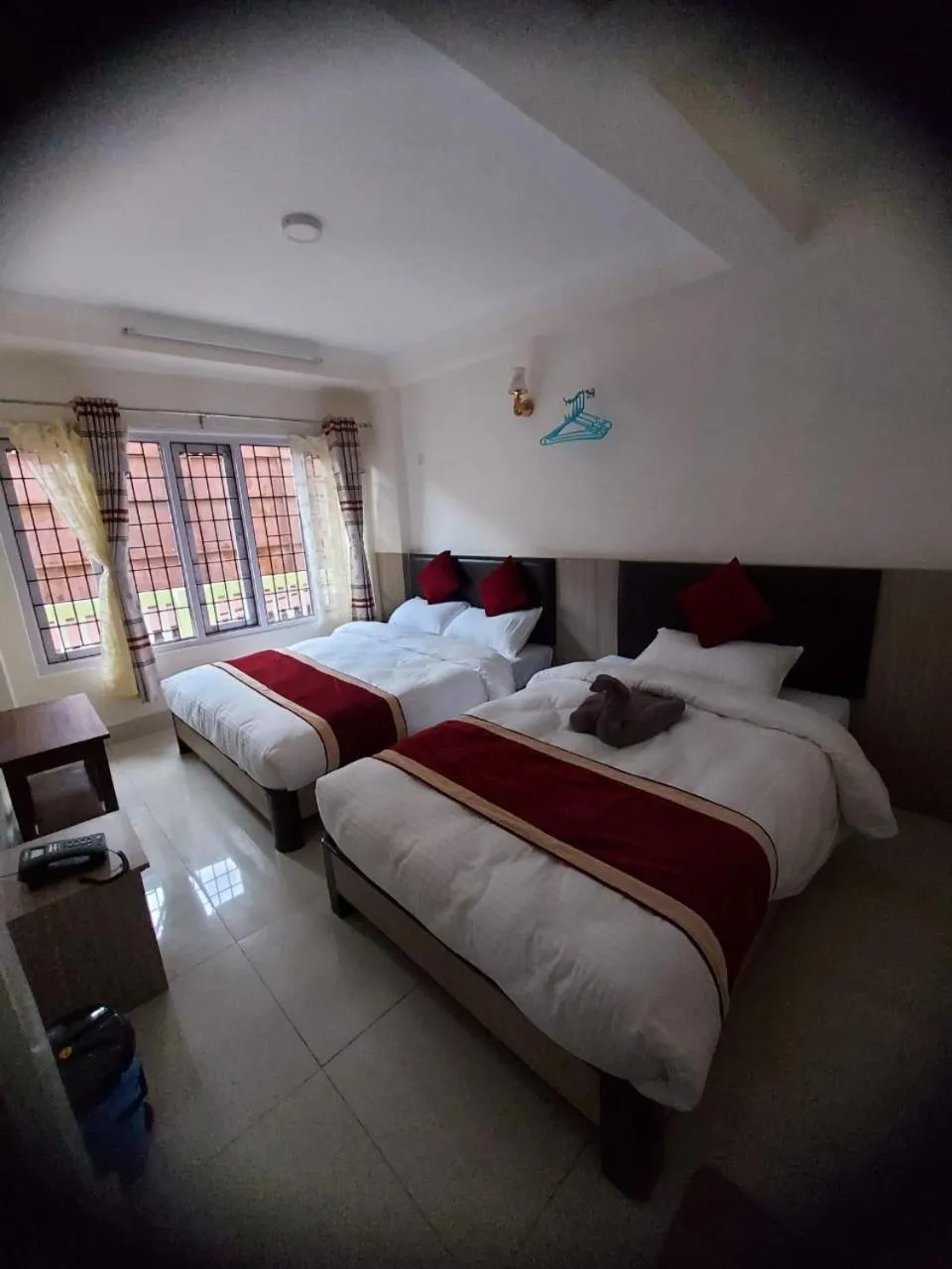 Bed in Om Bramha Hotel