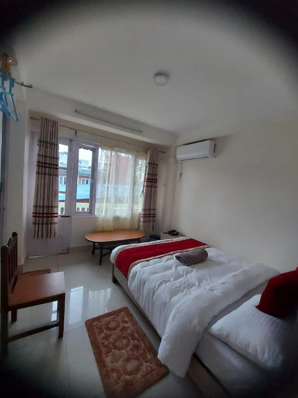 Bed in Om Bramha Hotel