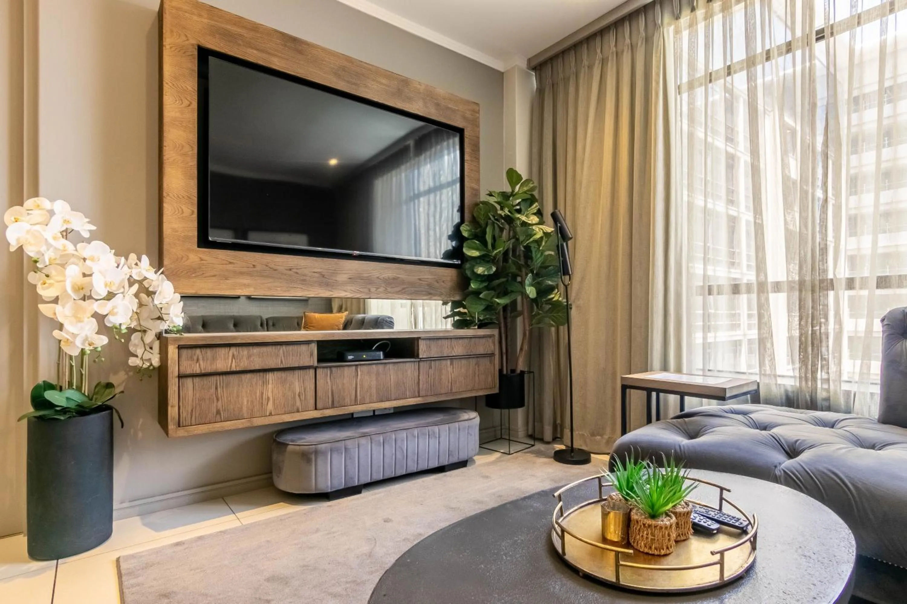 Communal lounge/ TV room in CGRSA Apartments Sandton