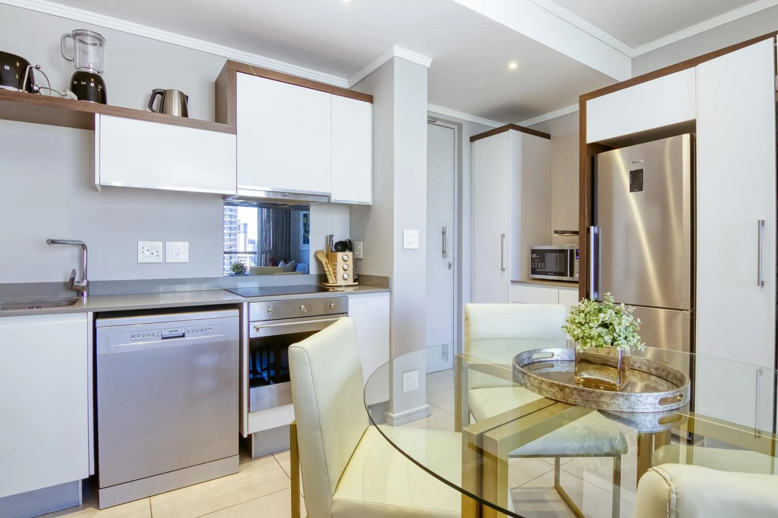 Kitchen or kitchenette in CGRSA Apartments Sandton