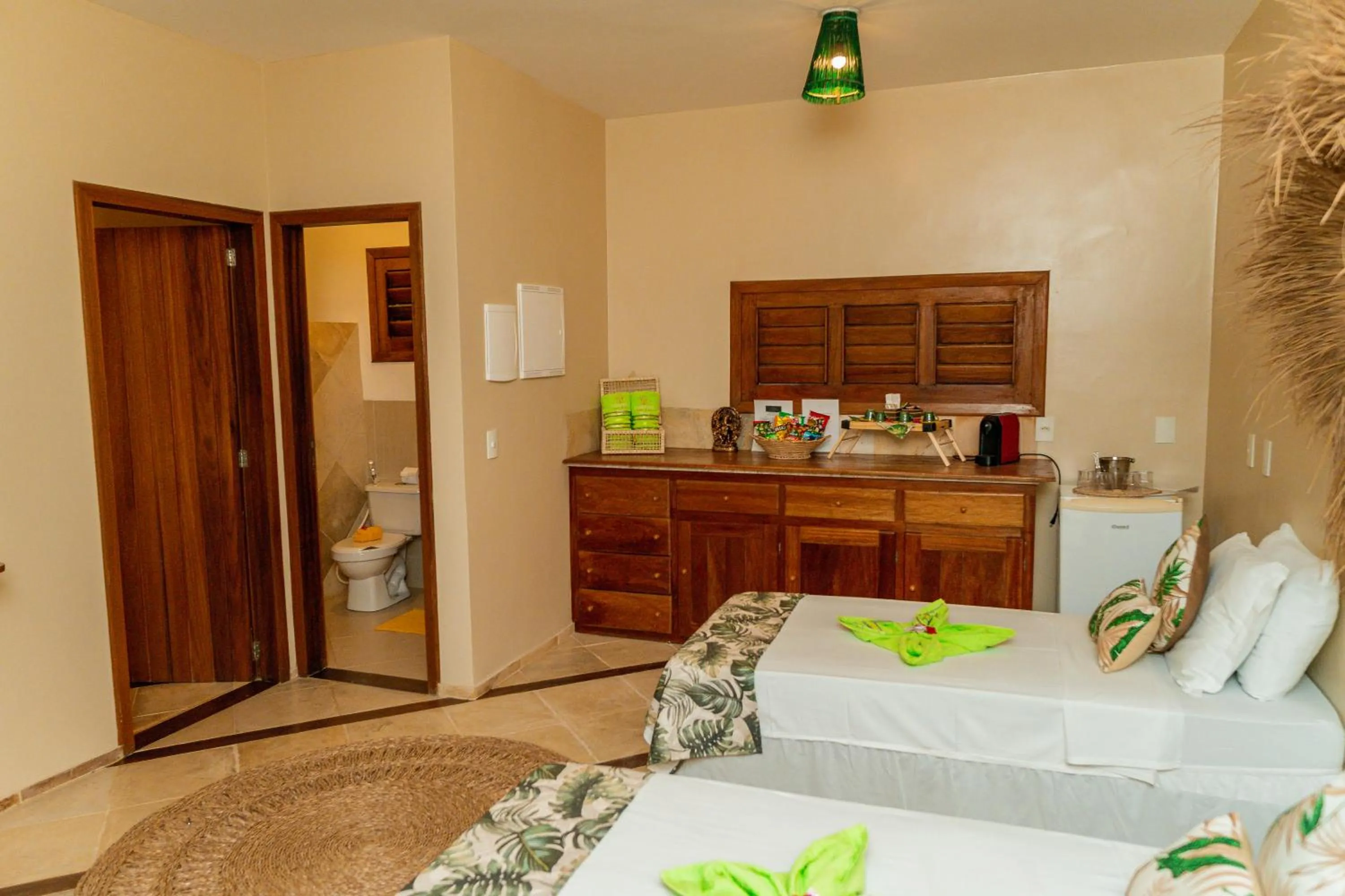 Bed in Camozen Resort & Spa