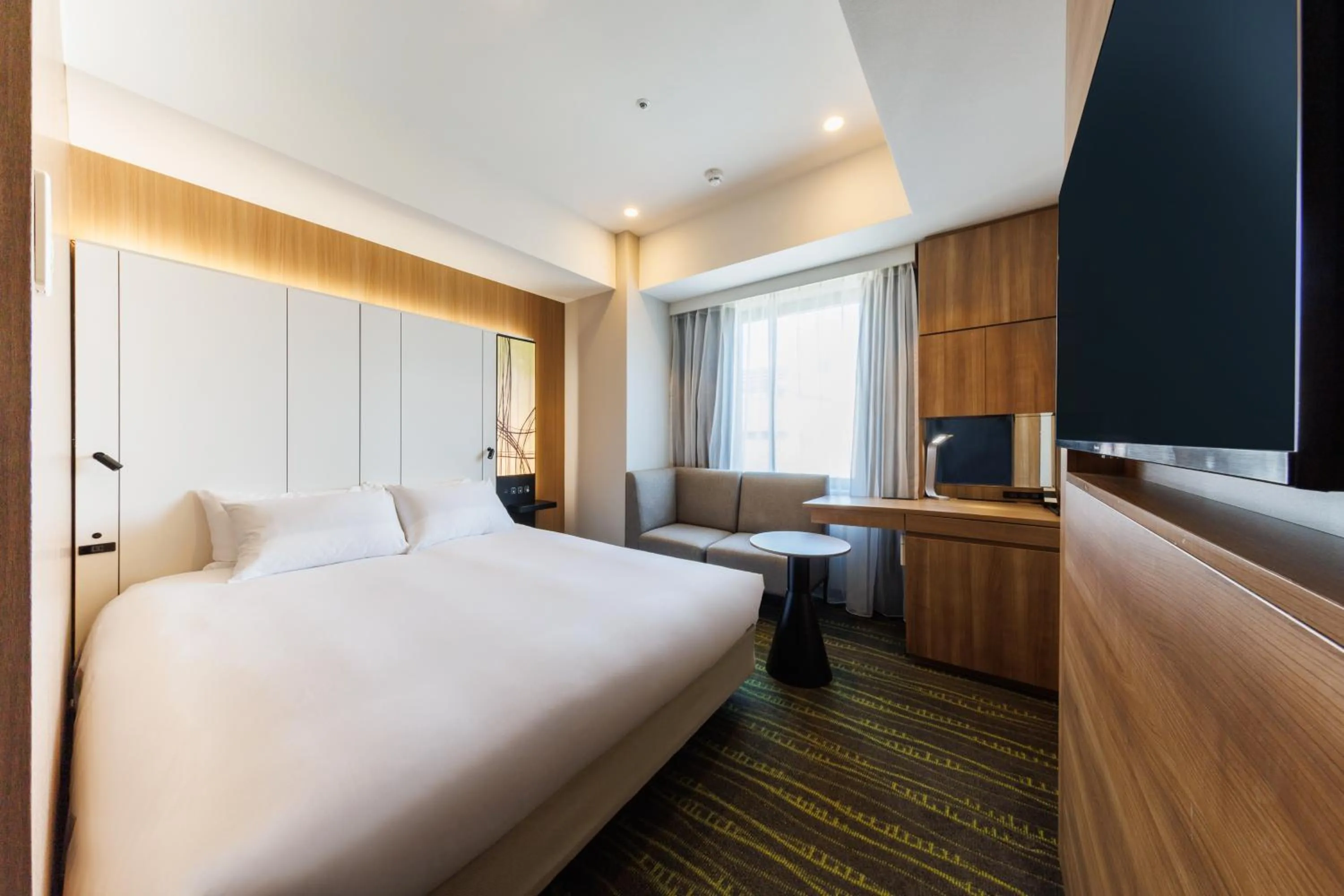 Photo of the whole room, Bed in JR-East Hotel Mets Shibuya