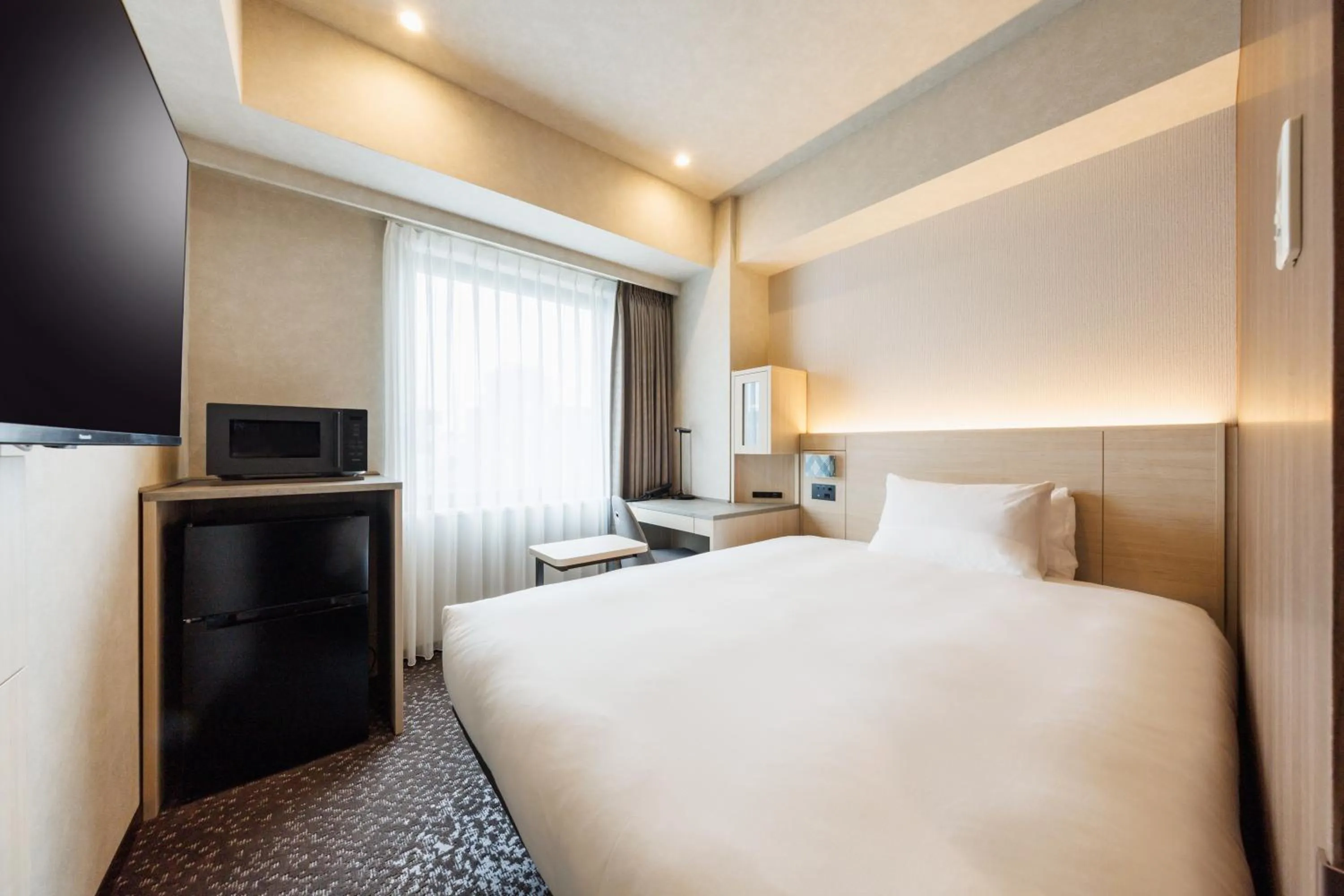 Photo of the whole room, Bed in JR-East Hotel Mets Shibuya