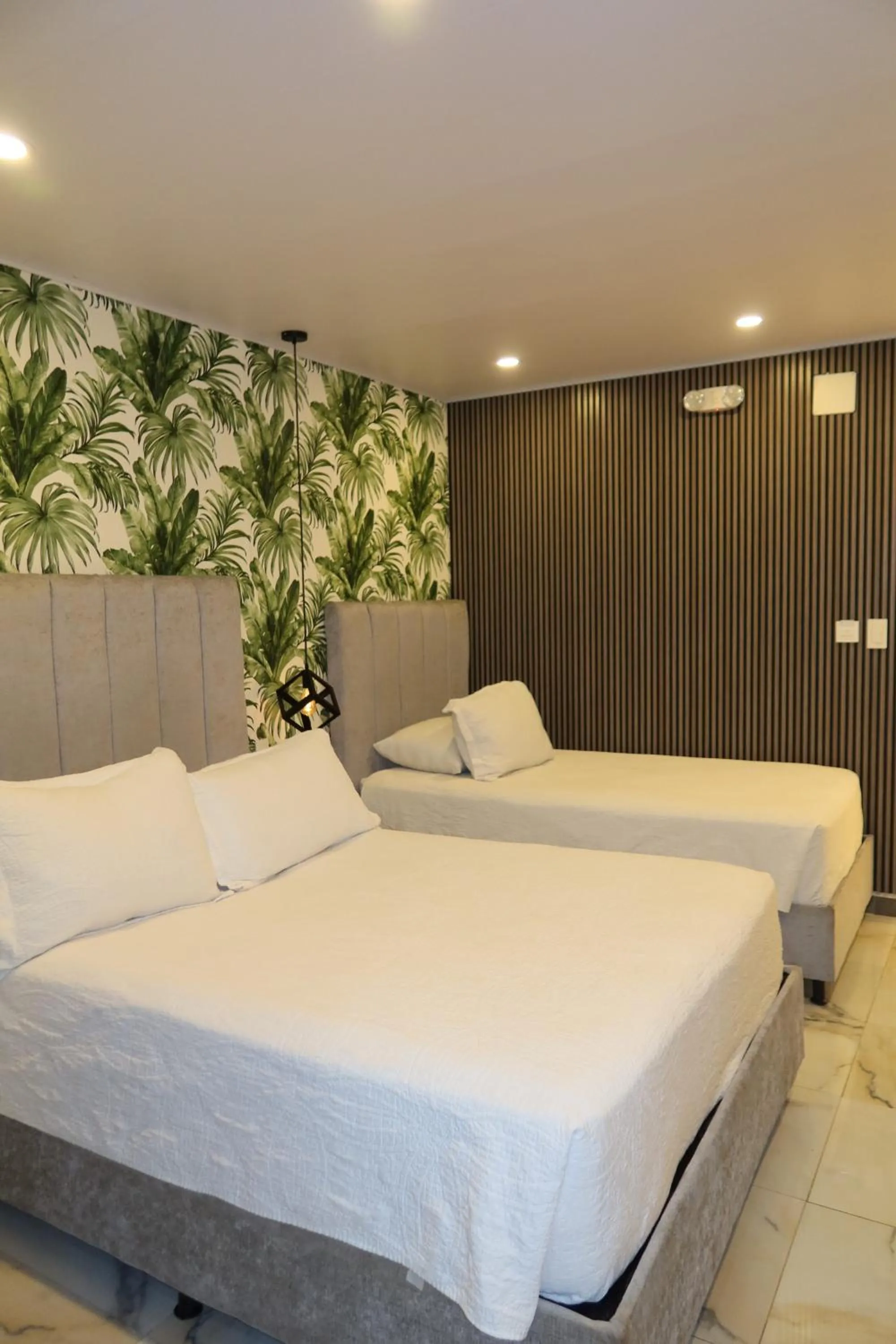 Photo of the whole room, Bed in WH HOTEL