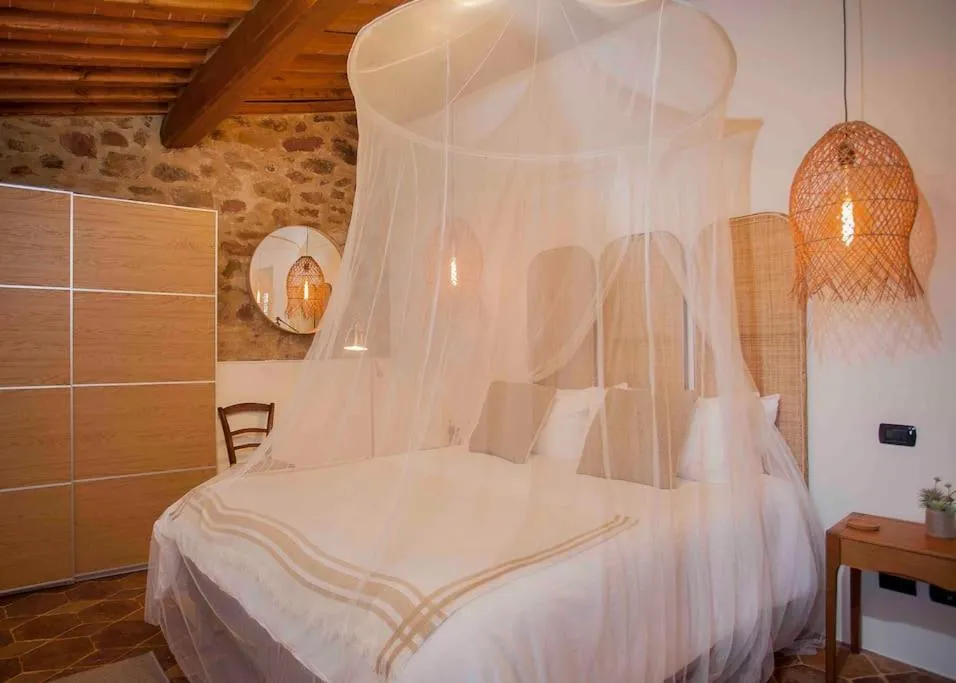 Bed in Tuscan Escape Luxury 2 bedroom apartment with pool