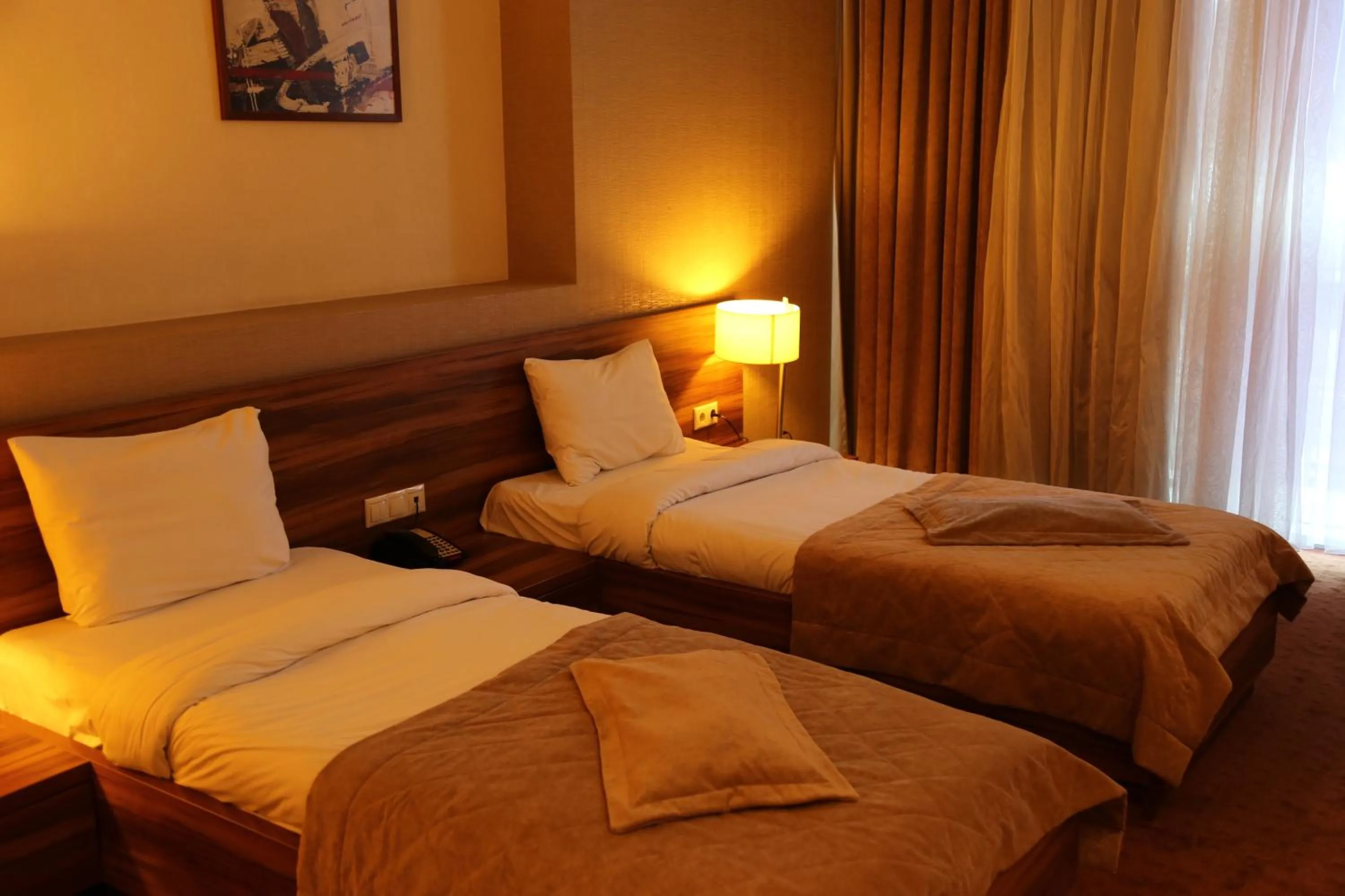 Bed in Avenue Hotel Baku by Smart