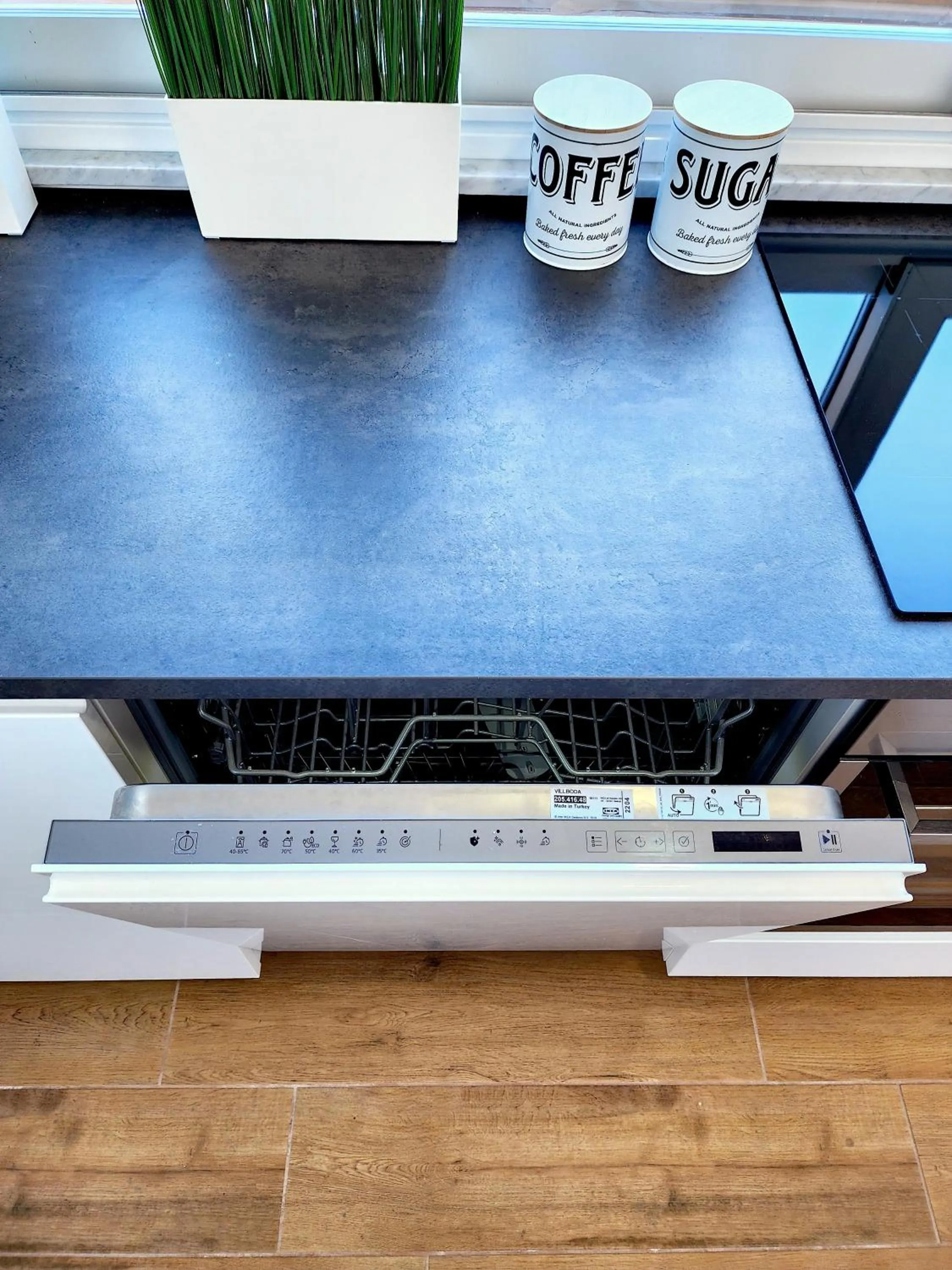 Kitchen or kitchenette in BACARDI Lungomare - Modern apartment near the sea