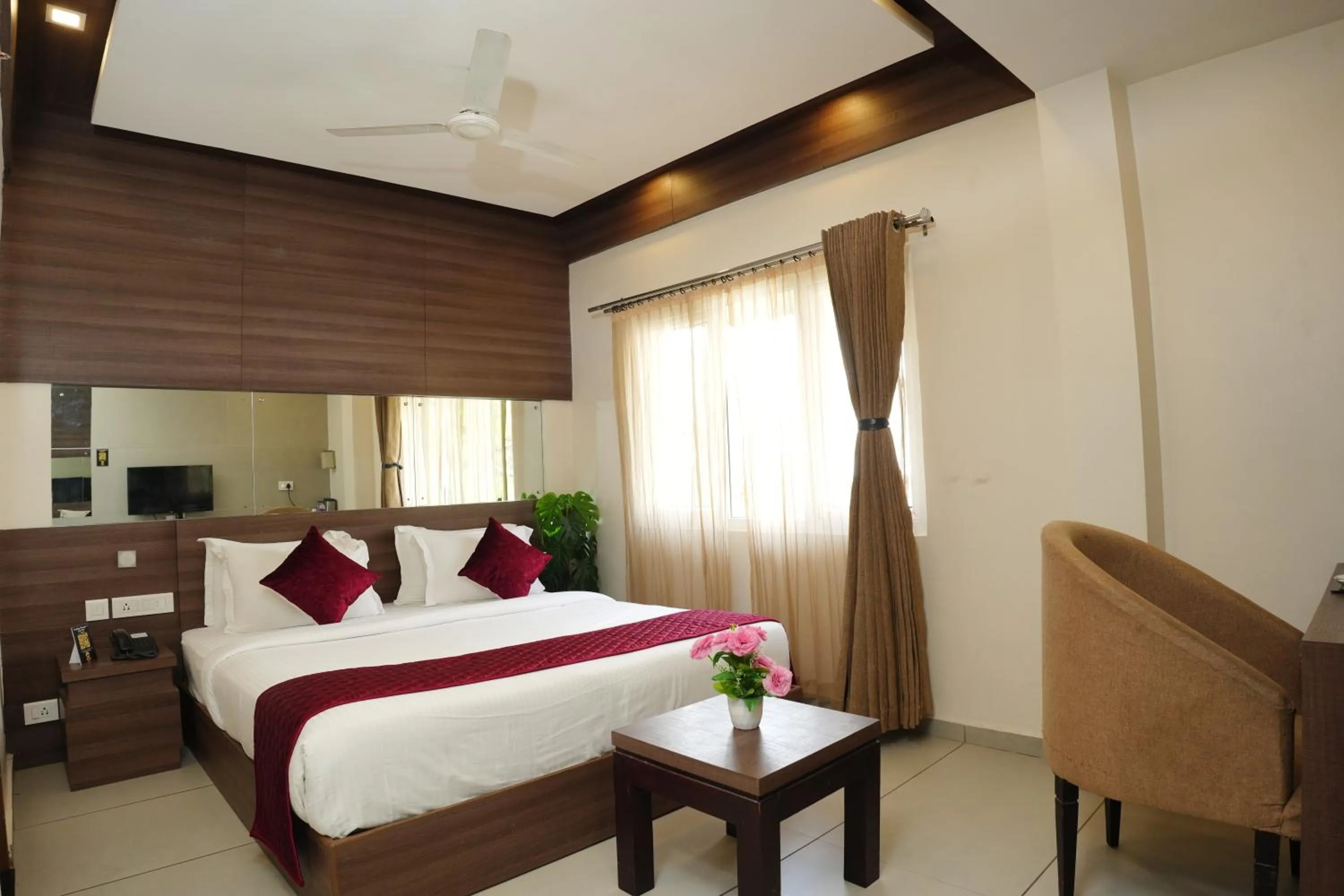 Photo of the whole room, Bed in Hotel Palmyra Grand Inn - Kochi