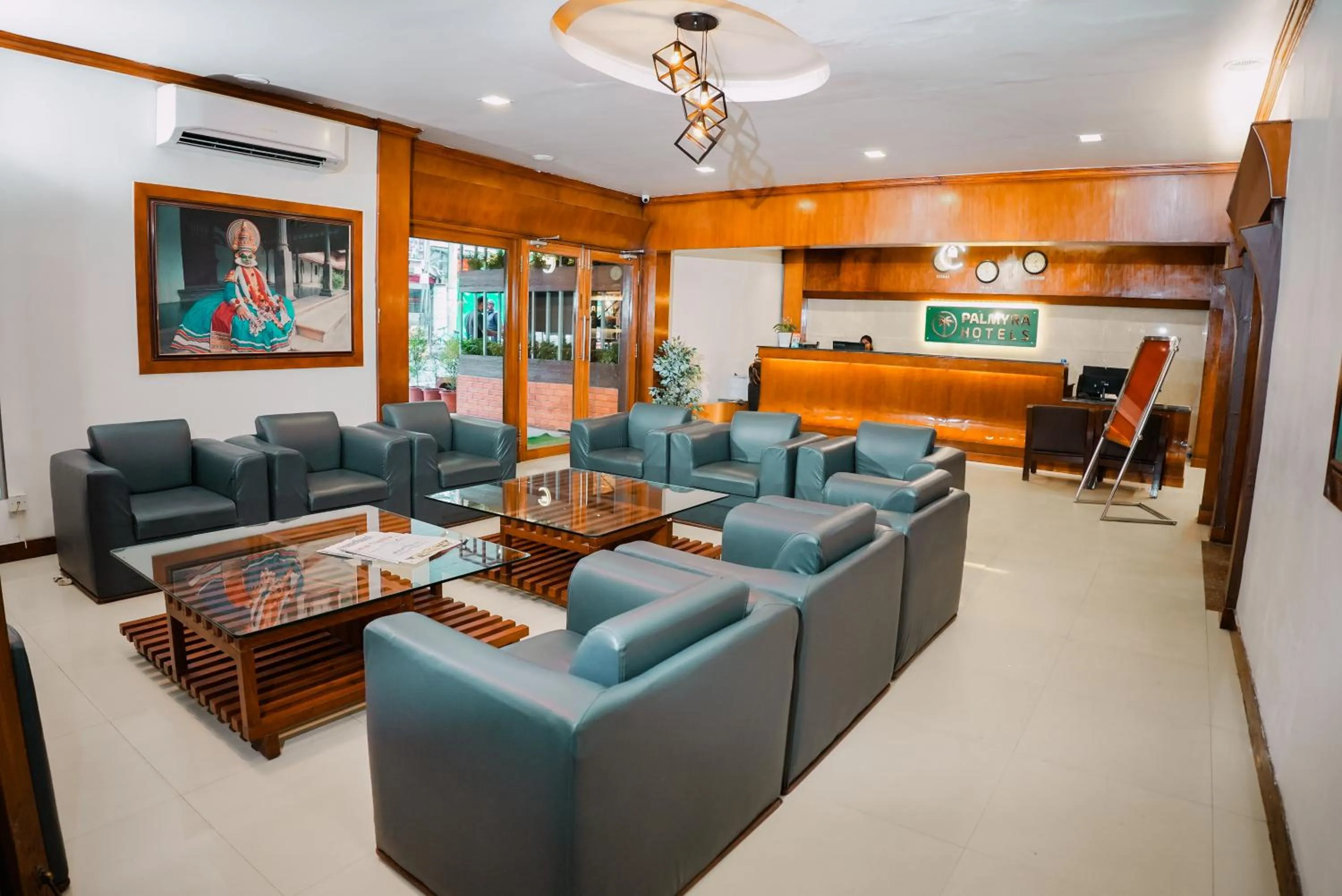 TV and multimedia in Hotel Palmyra Grand Inn - Kochi