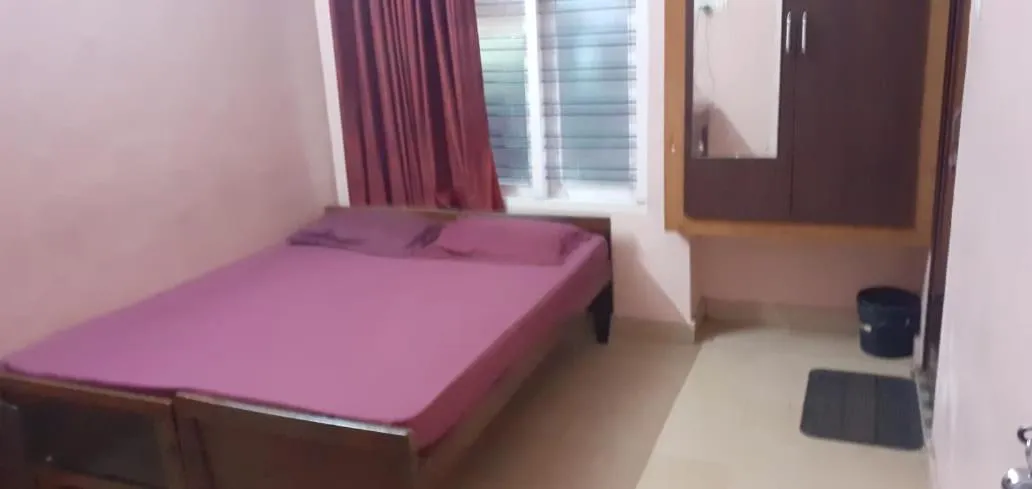 Bed in JEENA MOTEL