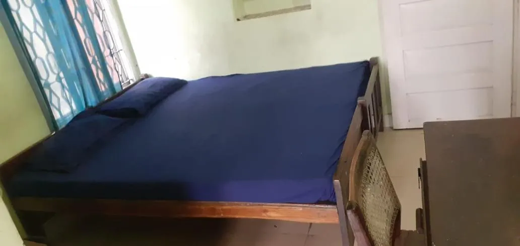 Bed in JEENA MOTEL