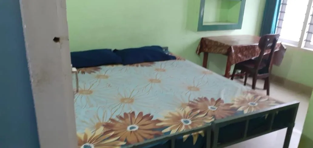 Bed in JEENA MOTEL