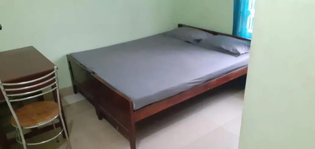 Bed in JEENA MOTEL