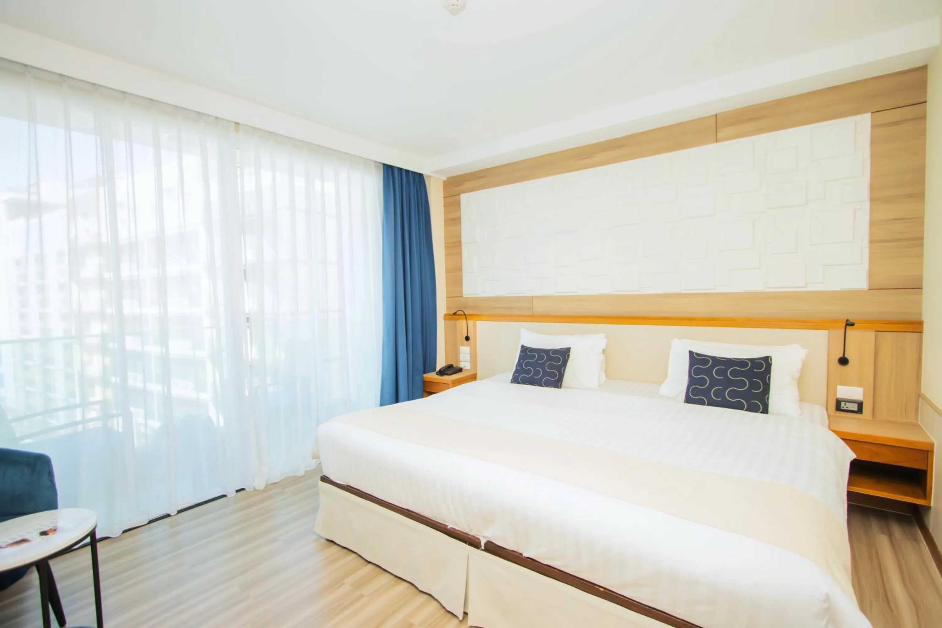 Bed in Sira Grande Hotel & Spa, Patong