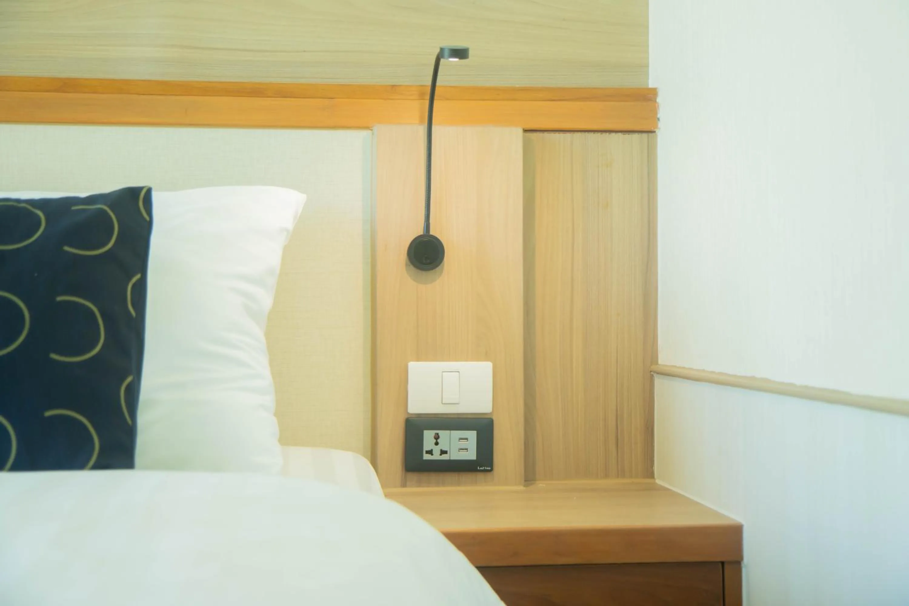 Bed in Sira Grande Hotel & Spa, Patong