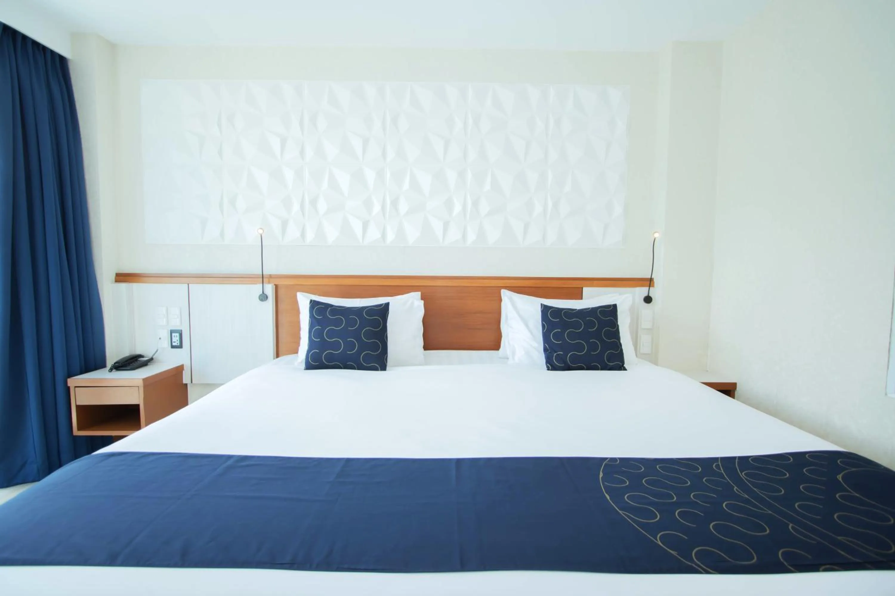 Bed in Sira Grande Hotel & Spa, Patong