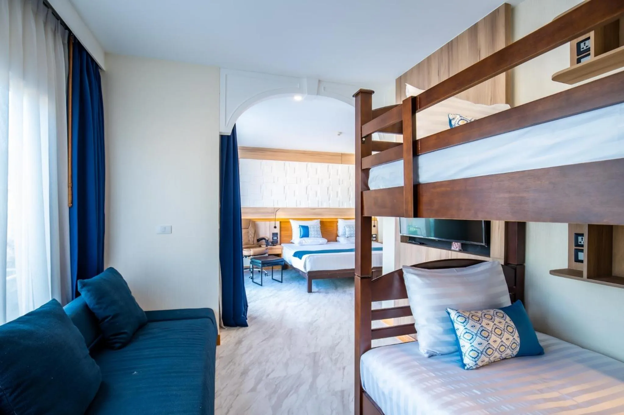 Seating area, Bed in Sira Grande Hotel & Spa, Patong